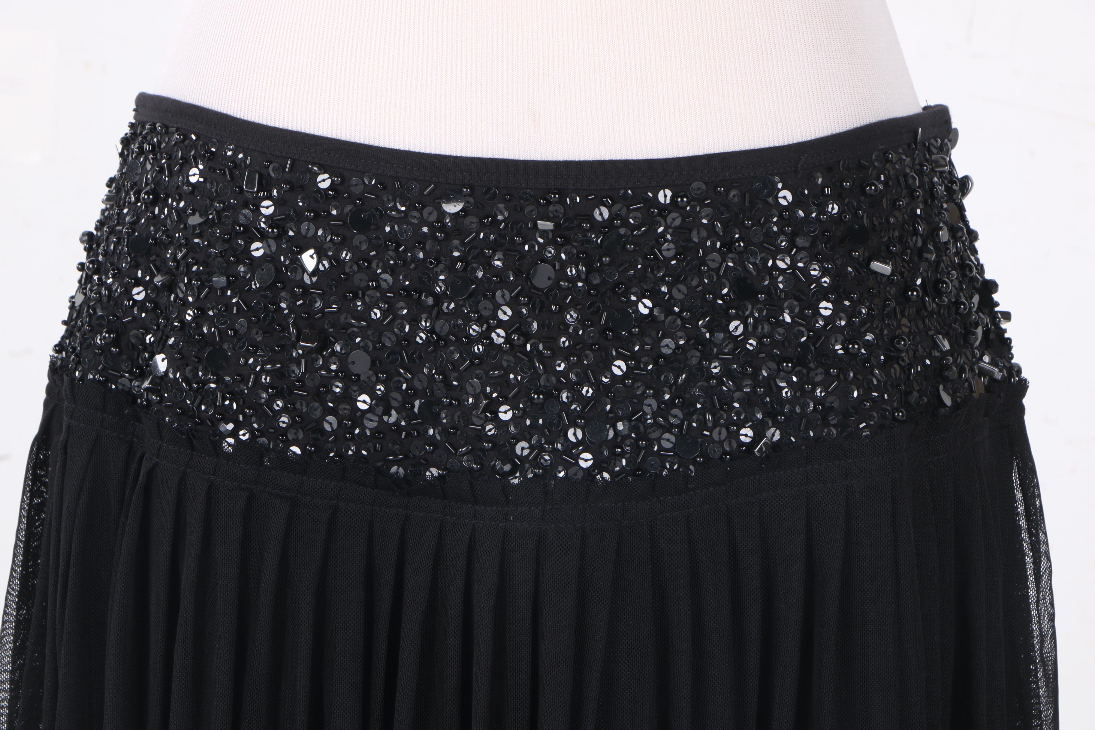 Three Women's Skirts and Pants