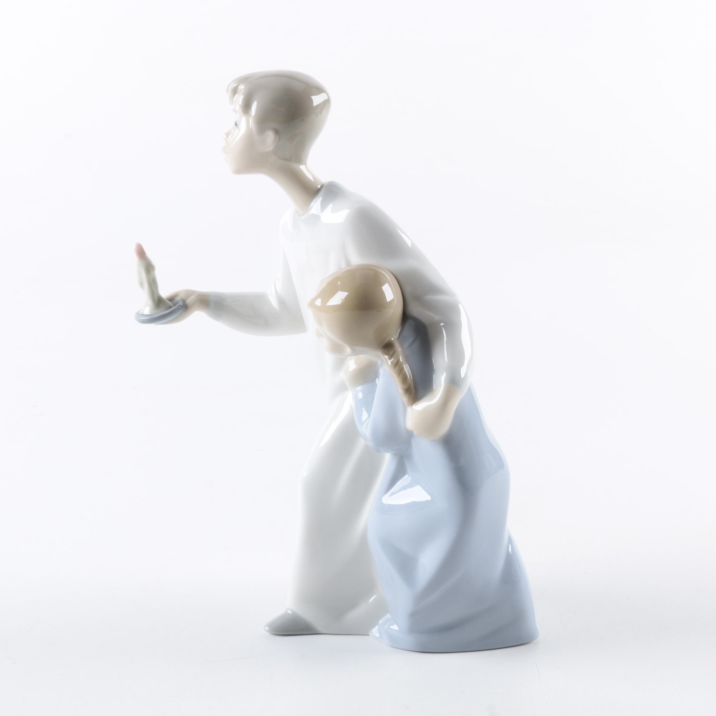 Lladró "Boy In Nightshirt" Figurine