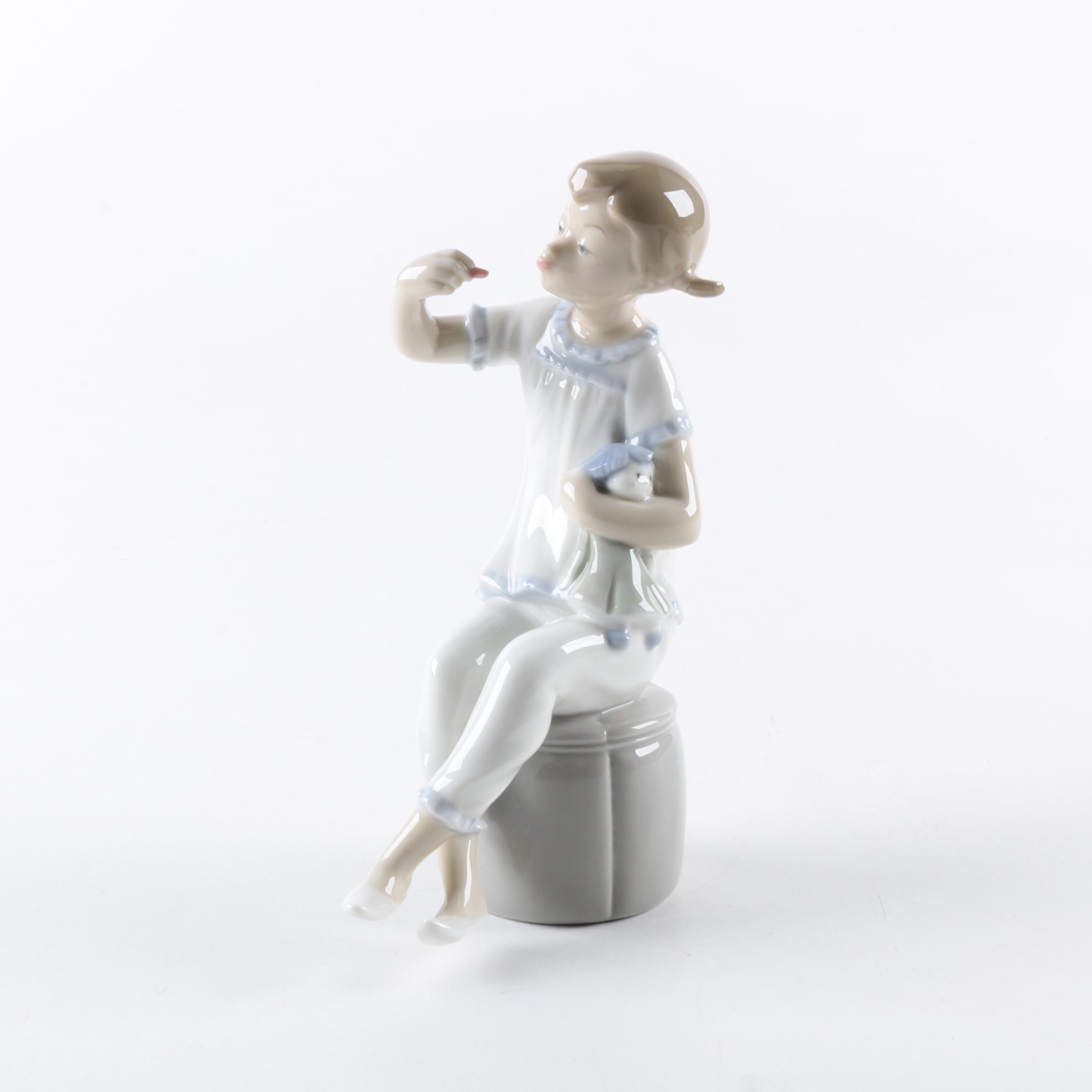 Lladró Porcelain "Girl With Doll" Figurine