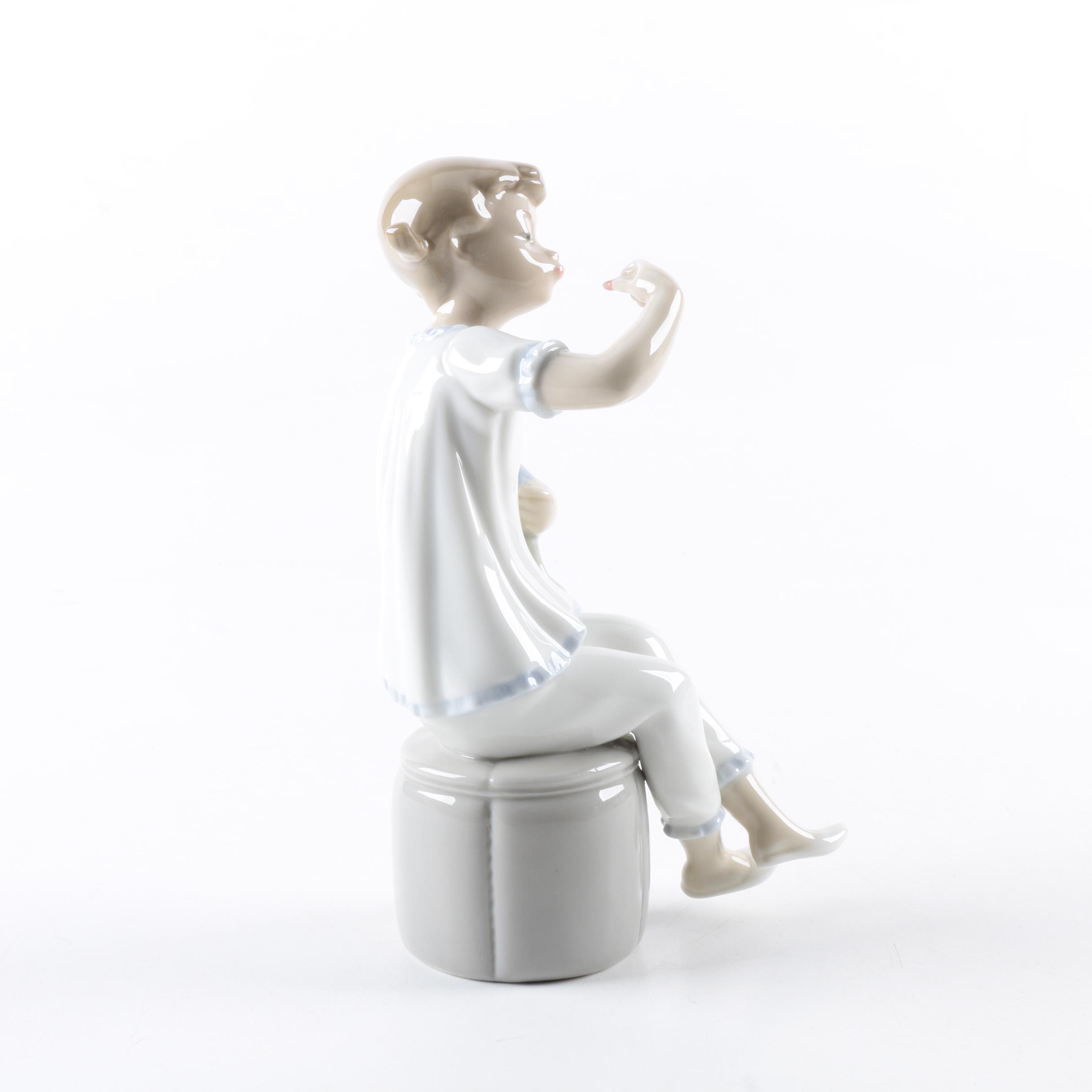 Lladró Porcelain "Girl With Doll" Figurine