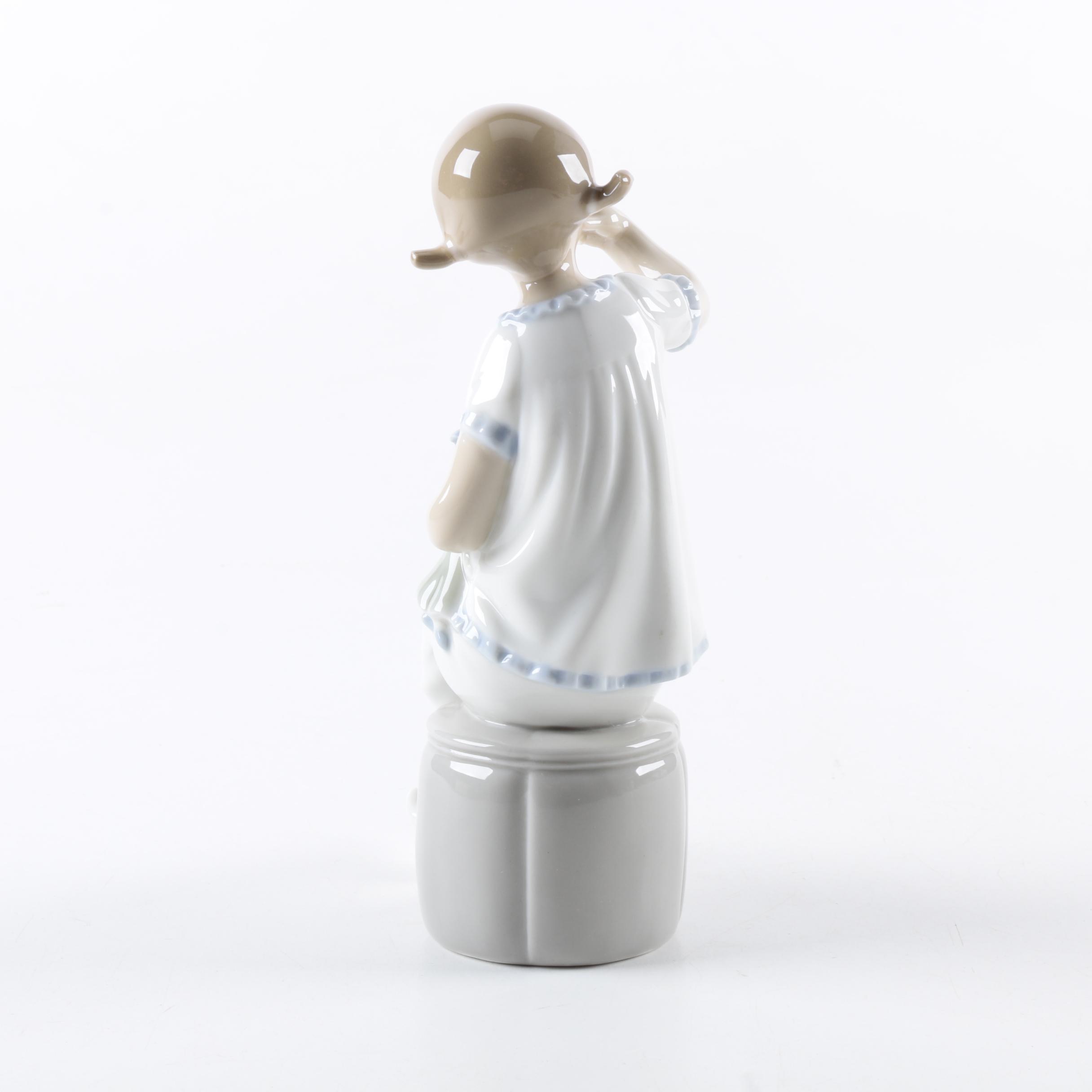 Lladró Porcelain "Girl With Doll" Figurine