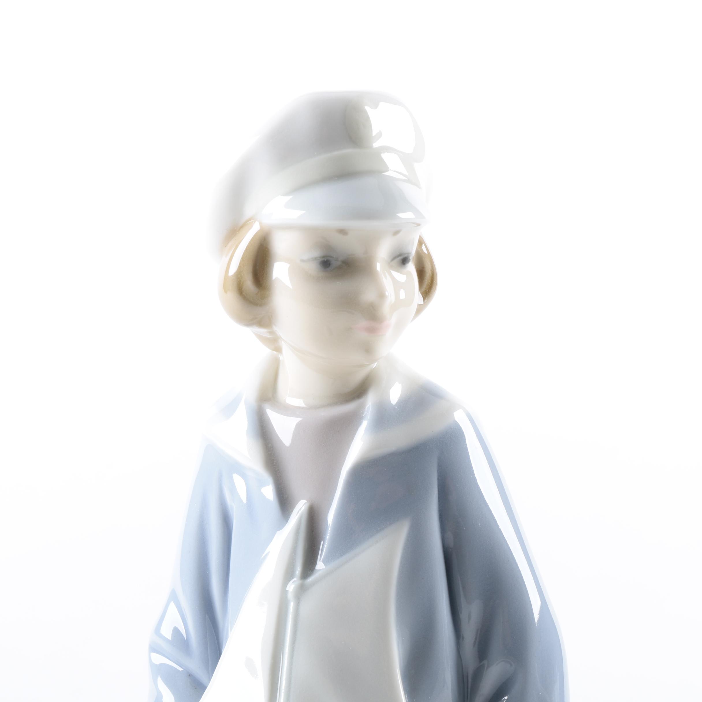 Retired Lladró "Boy with Yacht" Figurine