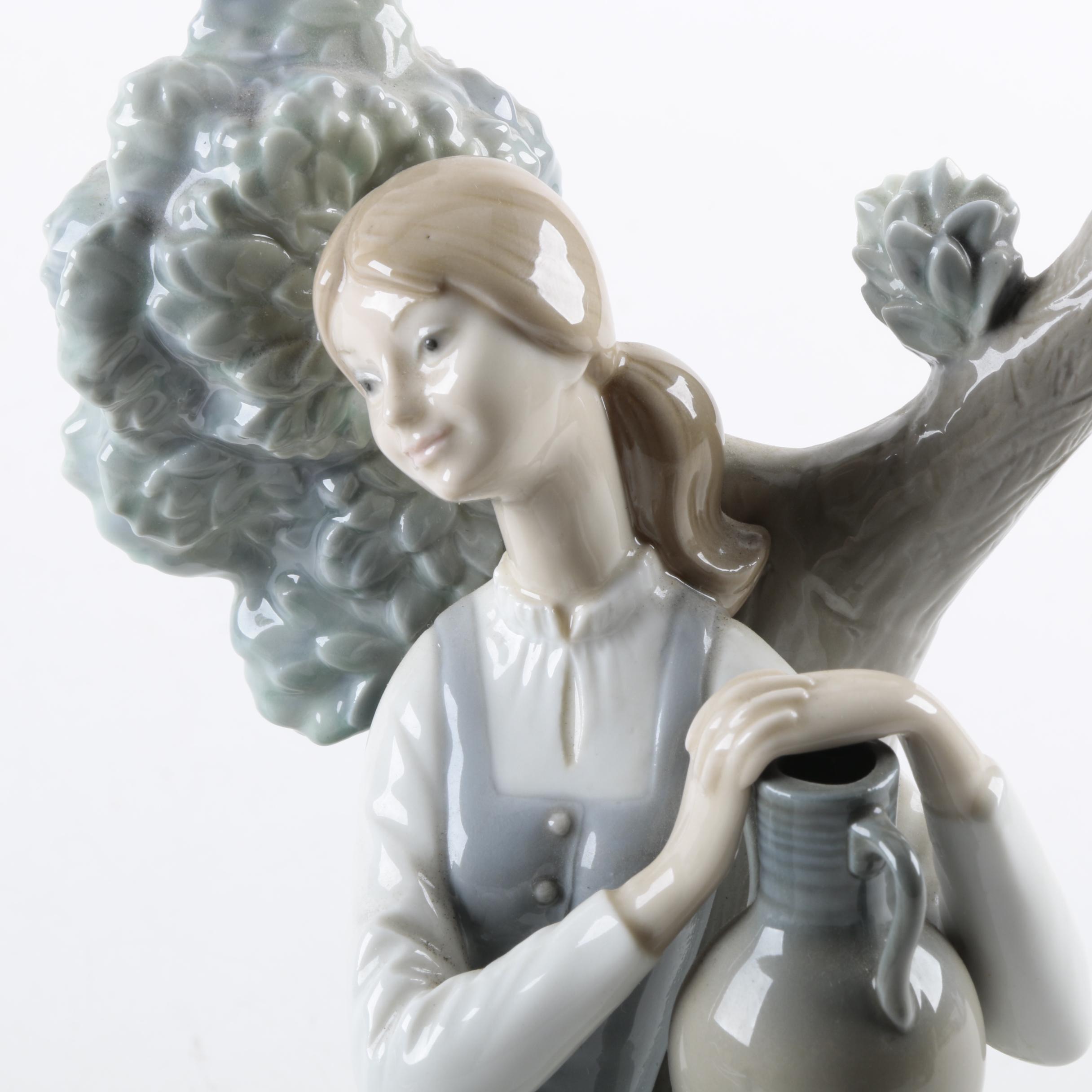 Lladró Woman Reclining with Geese Figurine