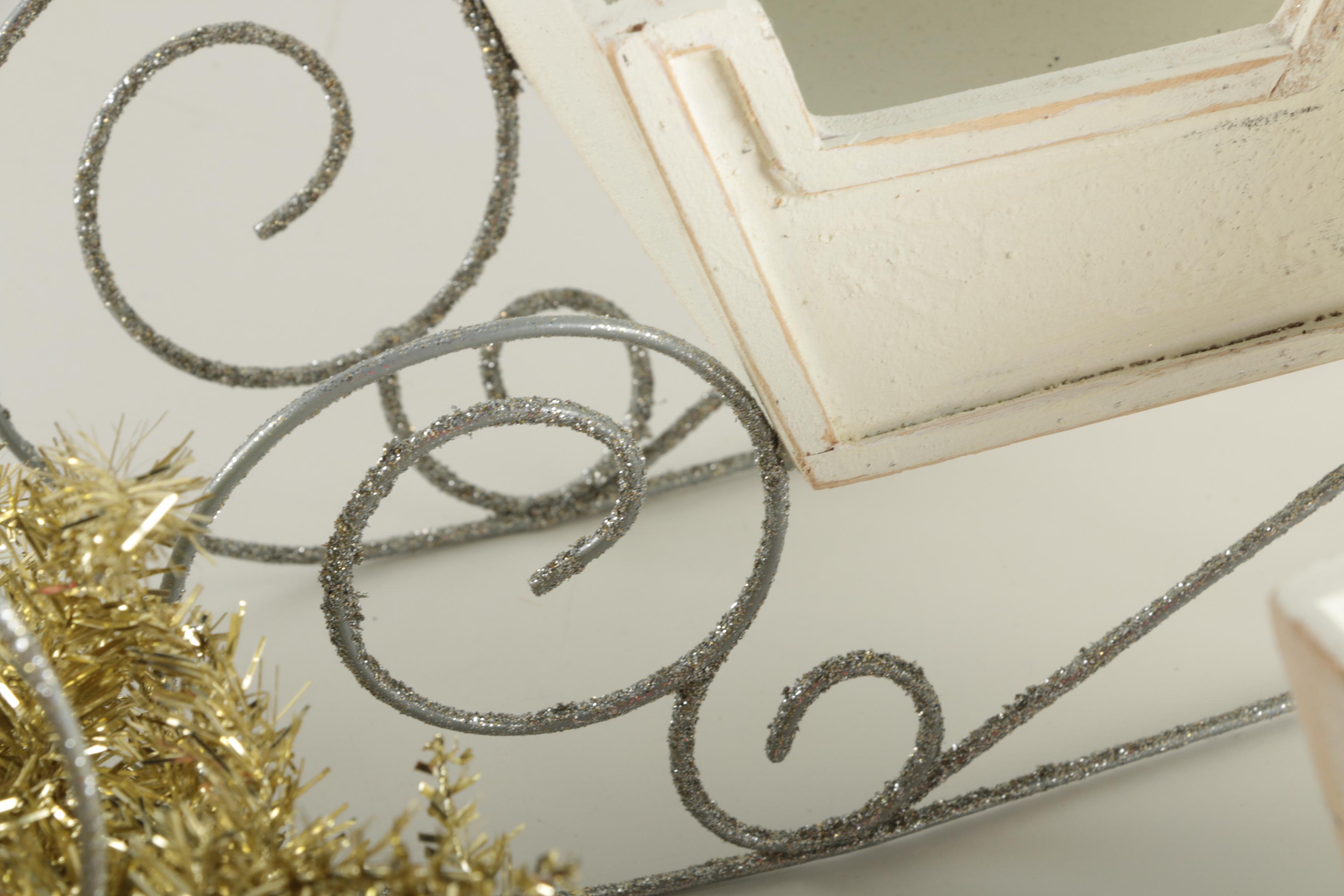 Gold Metallic Wreath and Wooden Decorative Sleds