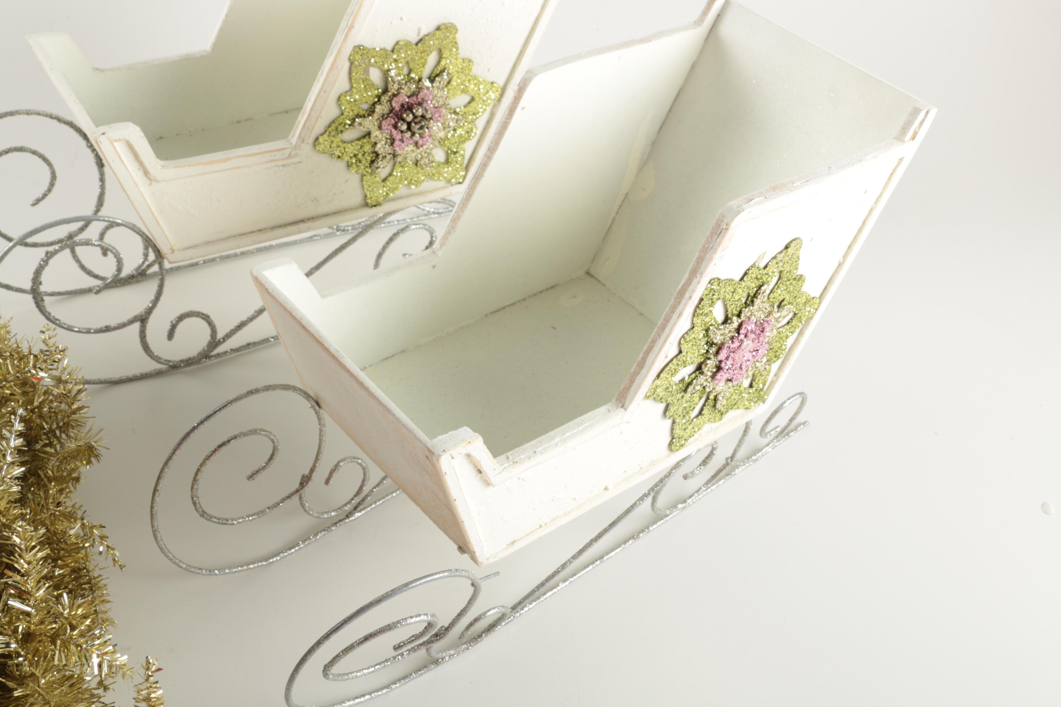 Gold Metallic Wreath and Wooden Decorative Sleds