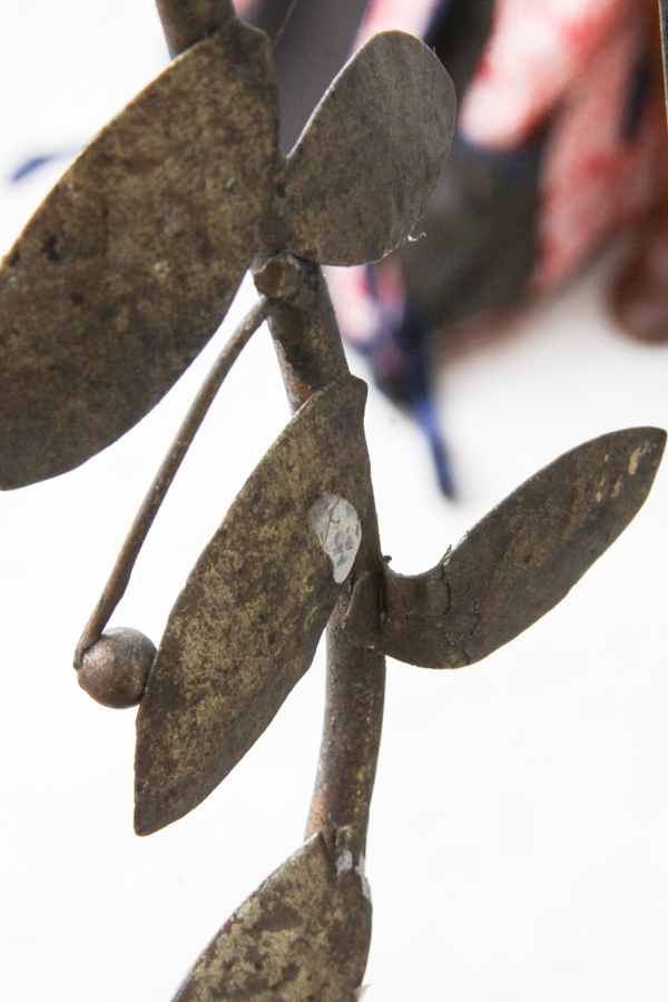 Ornate Framed Bevel Wall Mirror With Leafy Metal Accents