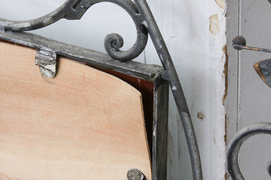 Ornate Framed Bevel Wall Mirror With Leafy Metal Accents