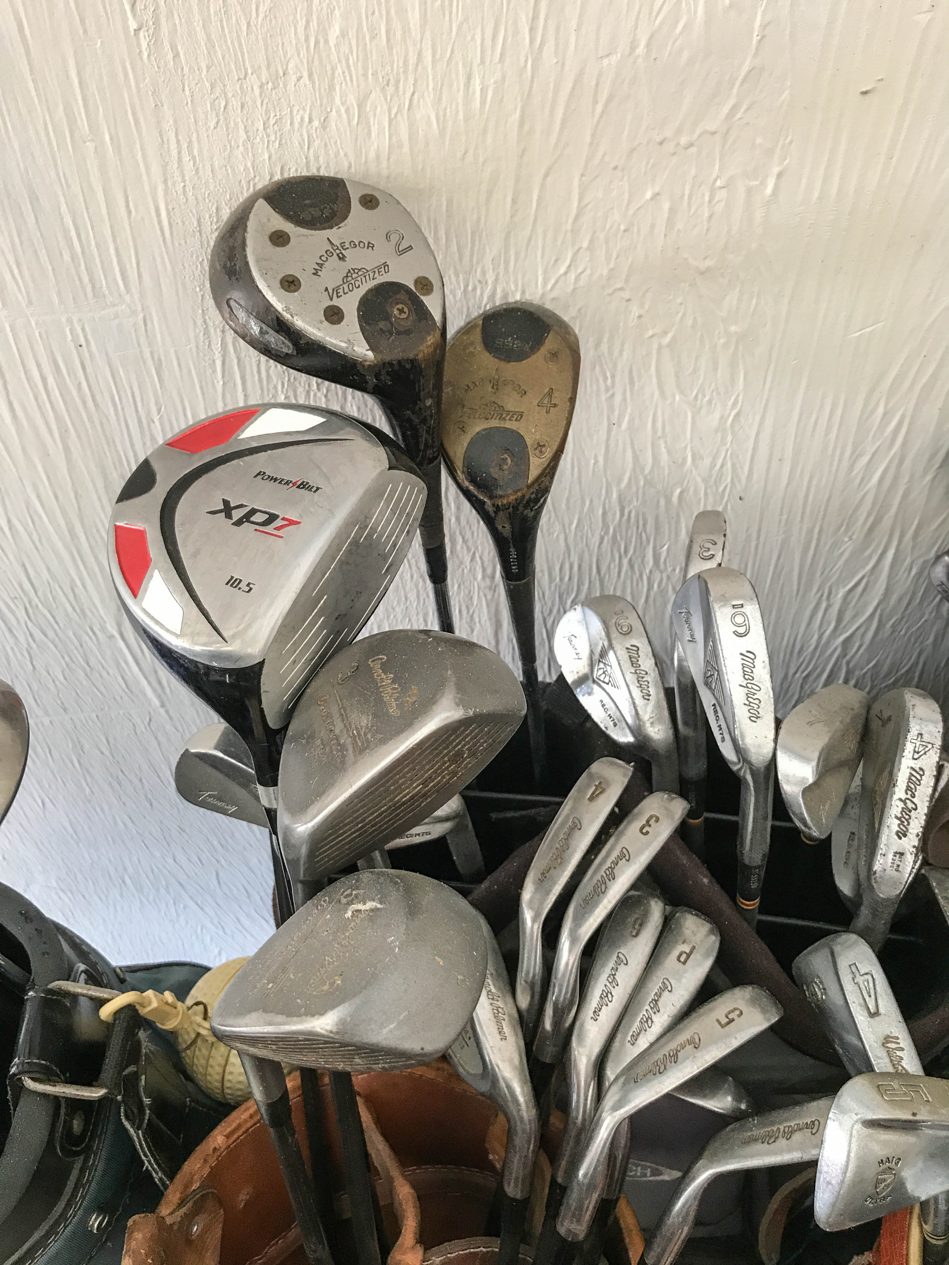 Five Golf Bags With Assorted Club Sets