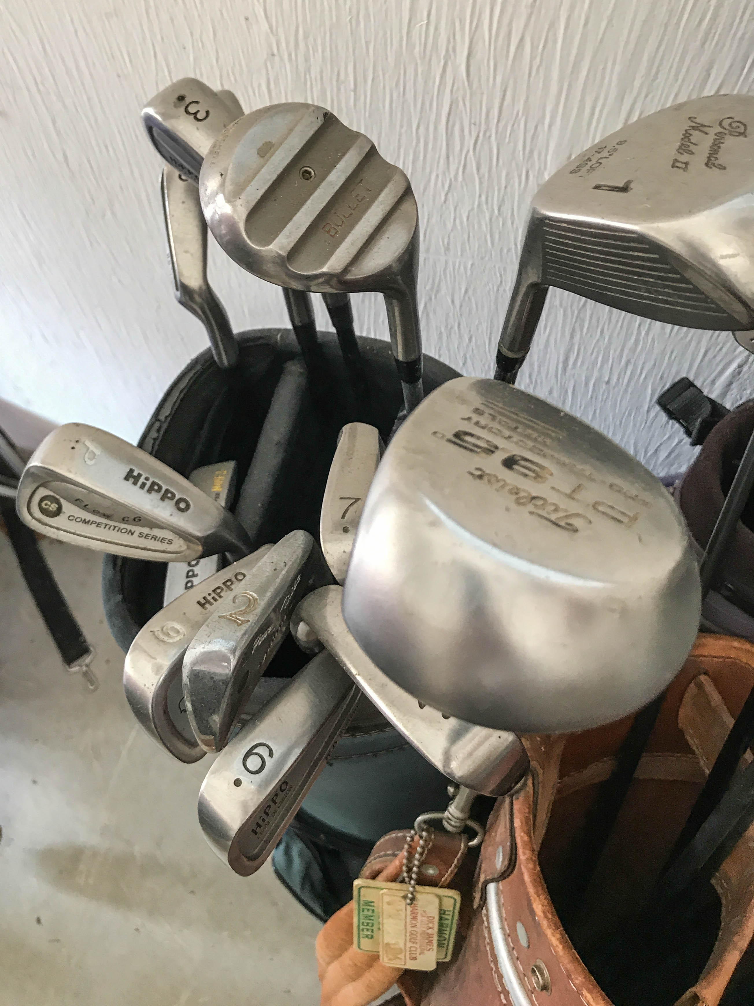 Five Golf Bags With Assorted Club Sets