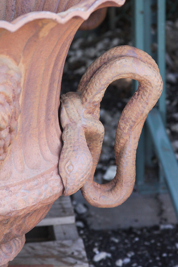 Pair of Cast Iron Serpent Urns