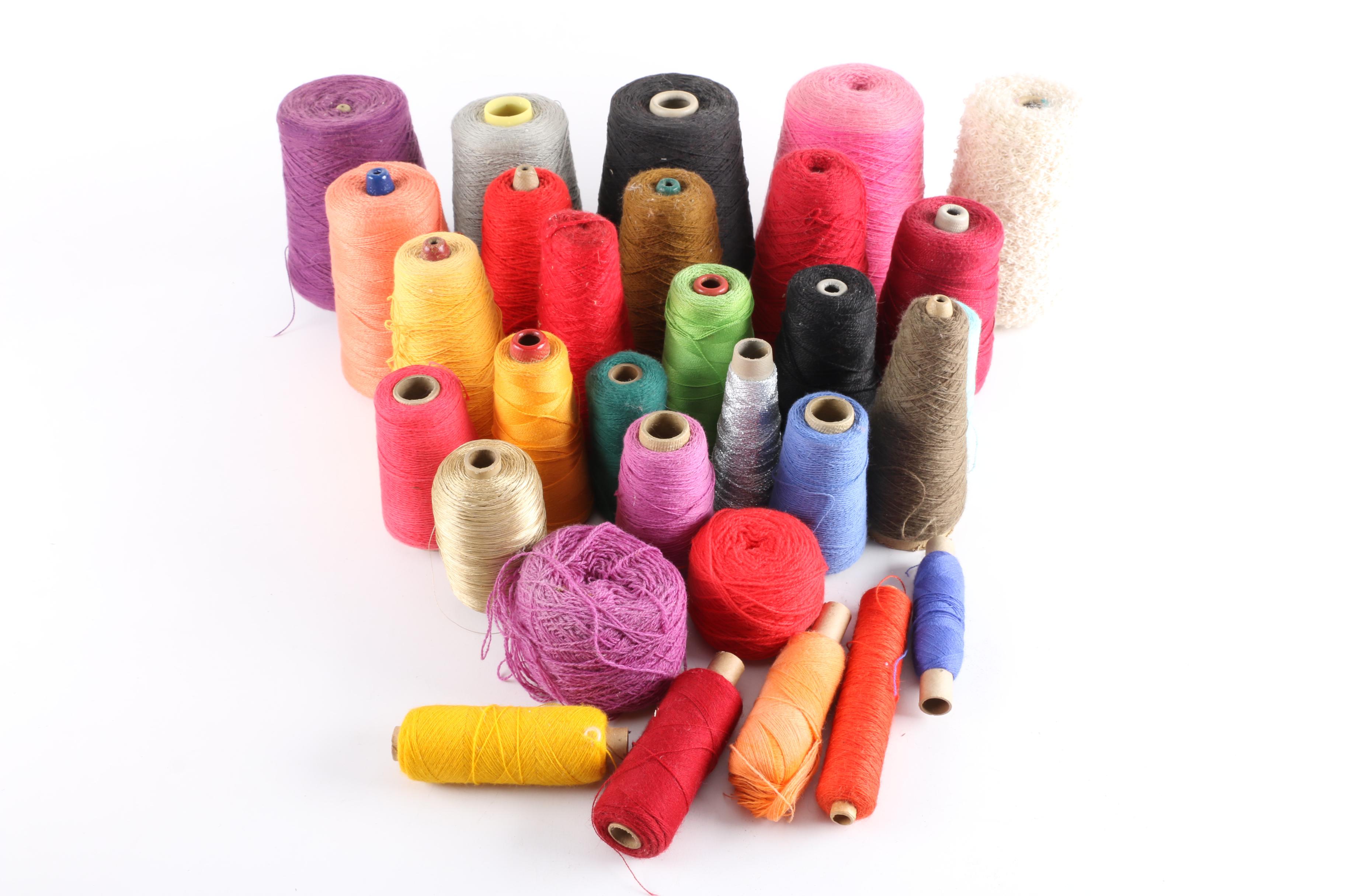 Woven Basket with Spools of Yarn and Thread