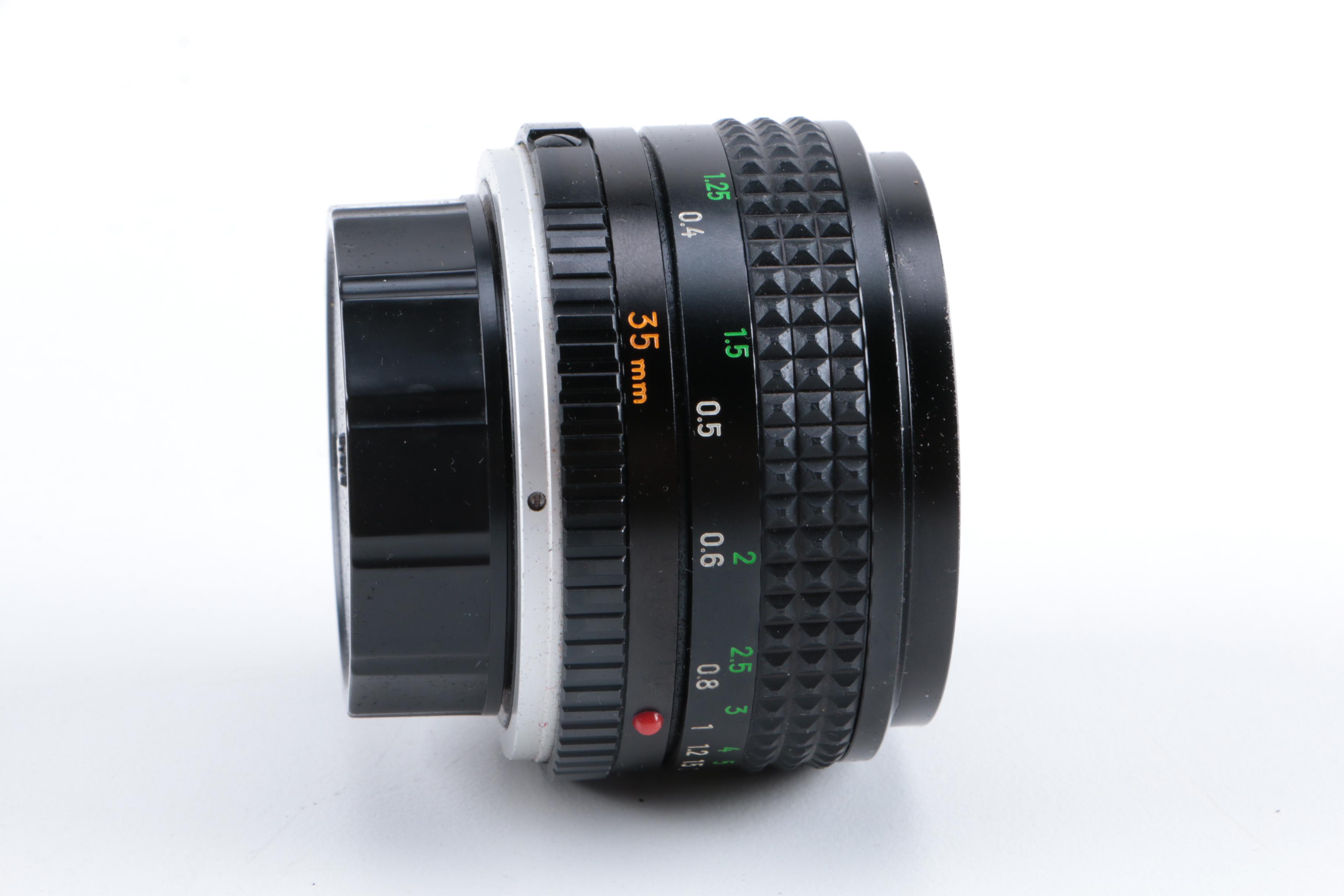 Vintage Minolta XE-5 and 16 EE II Cameras with Accessories