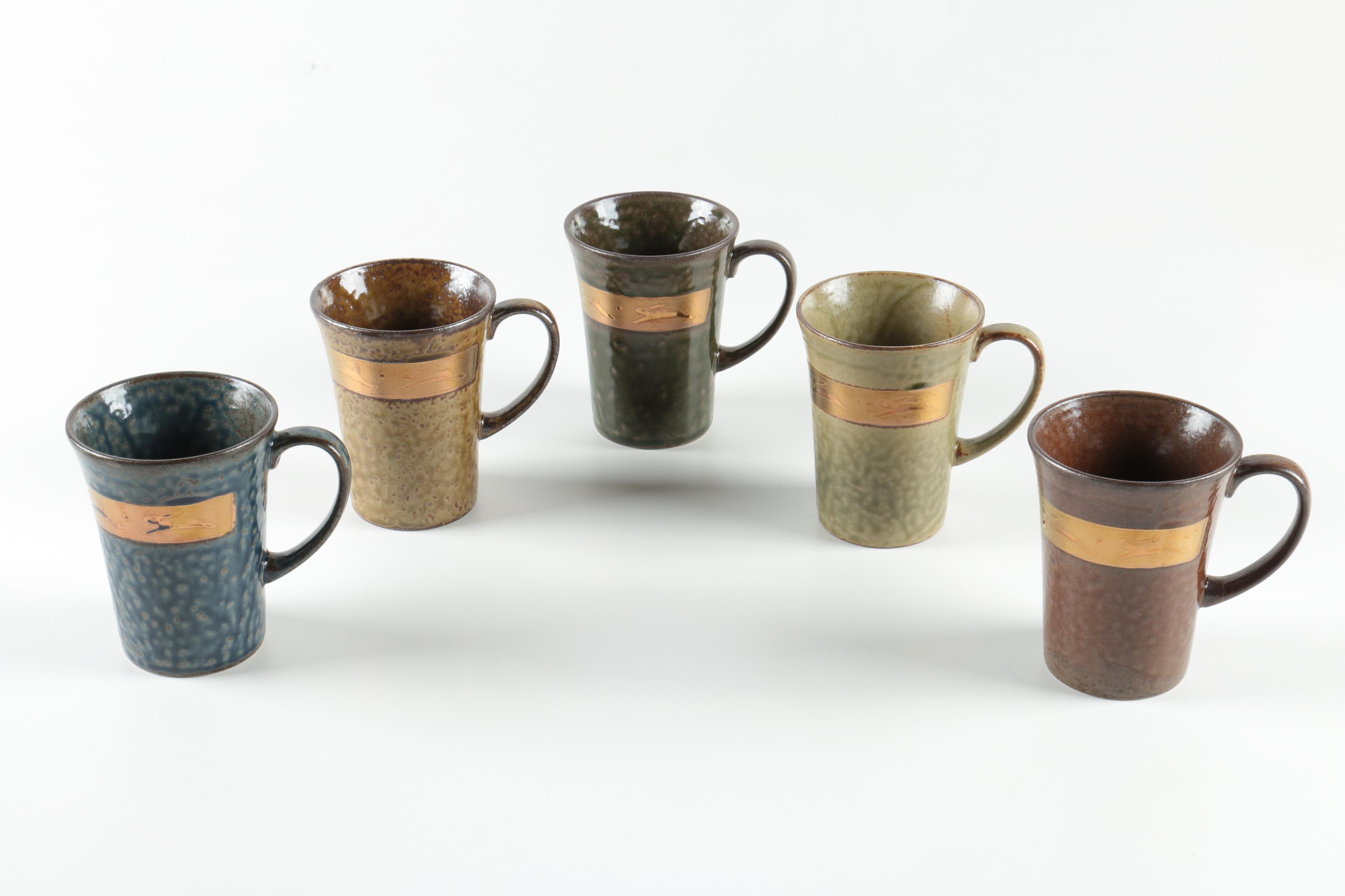 Collection of Ceramic Tea Steeping Mugs and Tumblers