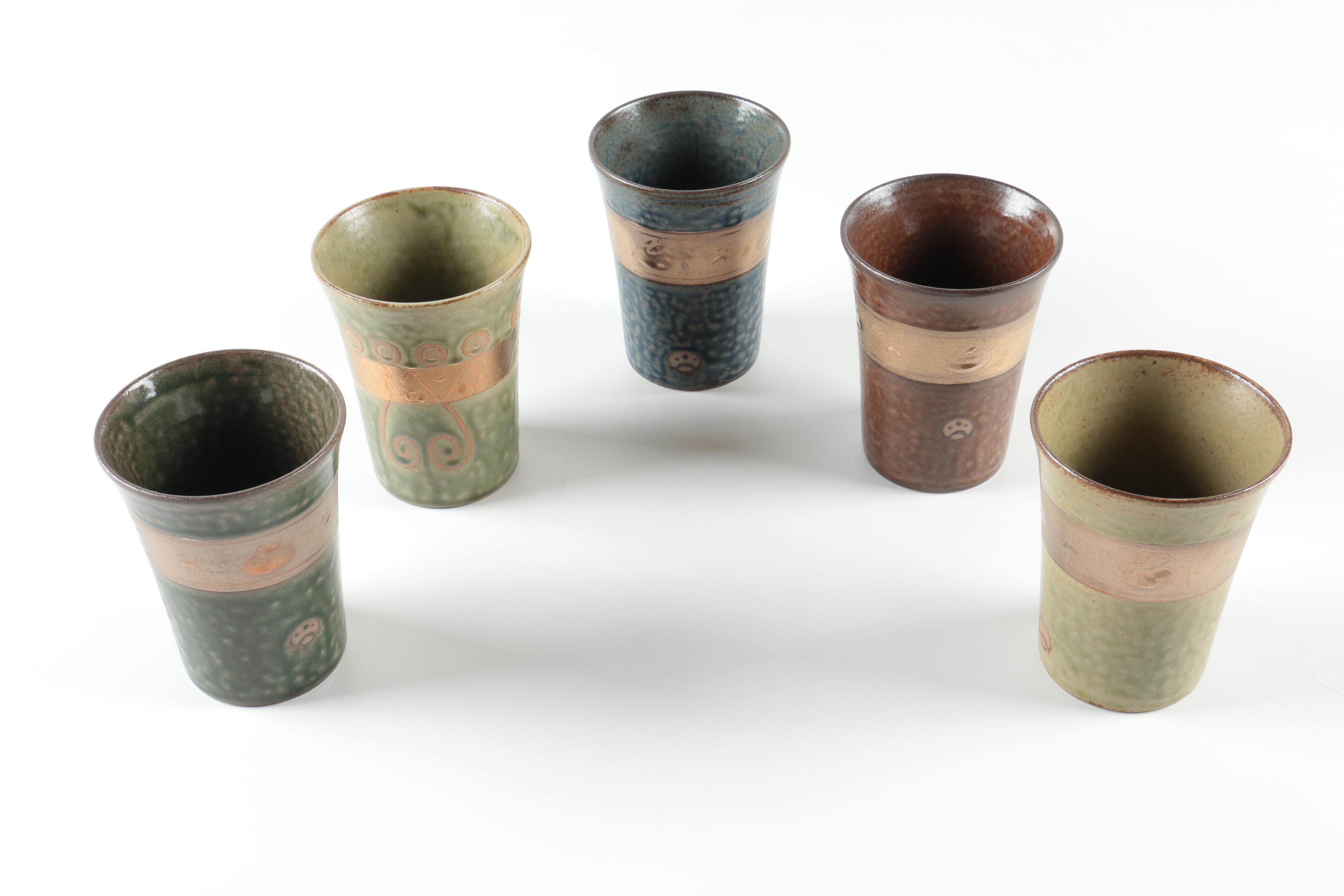 Collection of Ceramic Tea Steeping Mugs and Tumblers