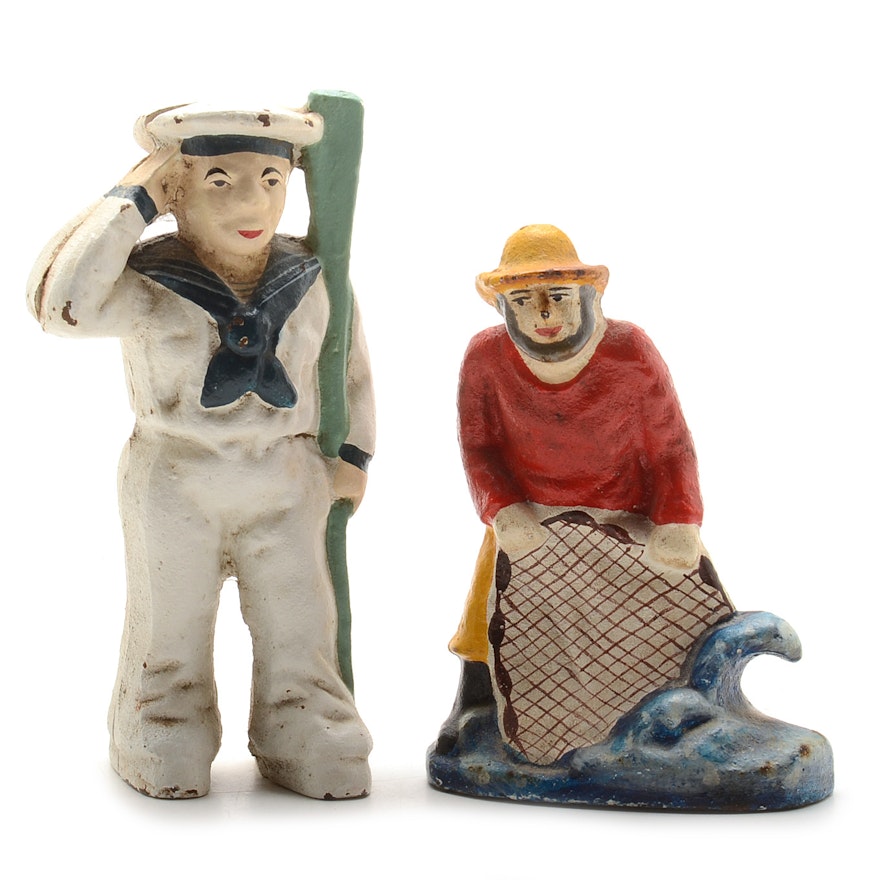 Two Cast Iron Figurines