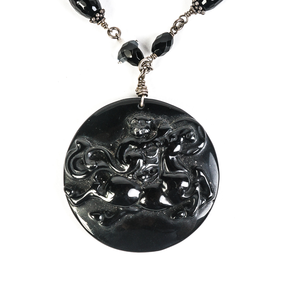 Sterling Silver and Carved Onyx Pendant Necklace