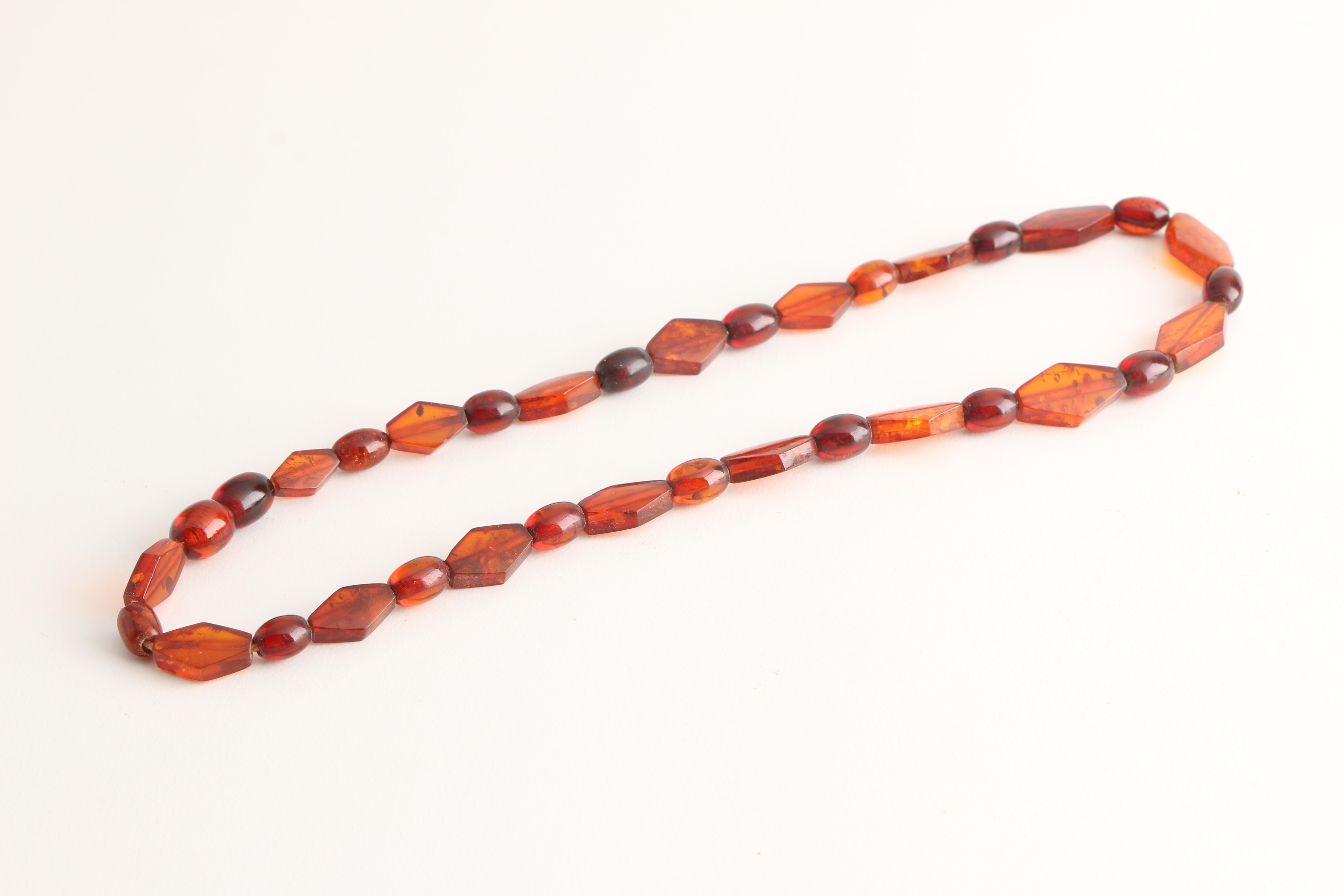 Three Amber Necklaces Including Mutton Fat Amber