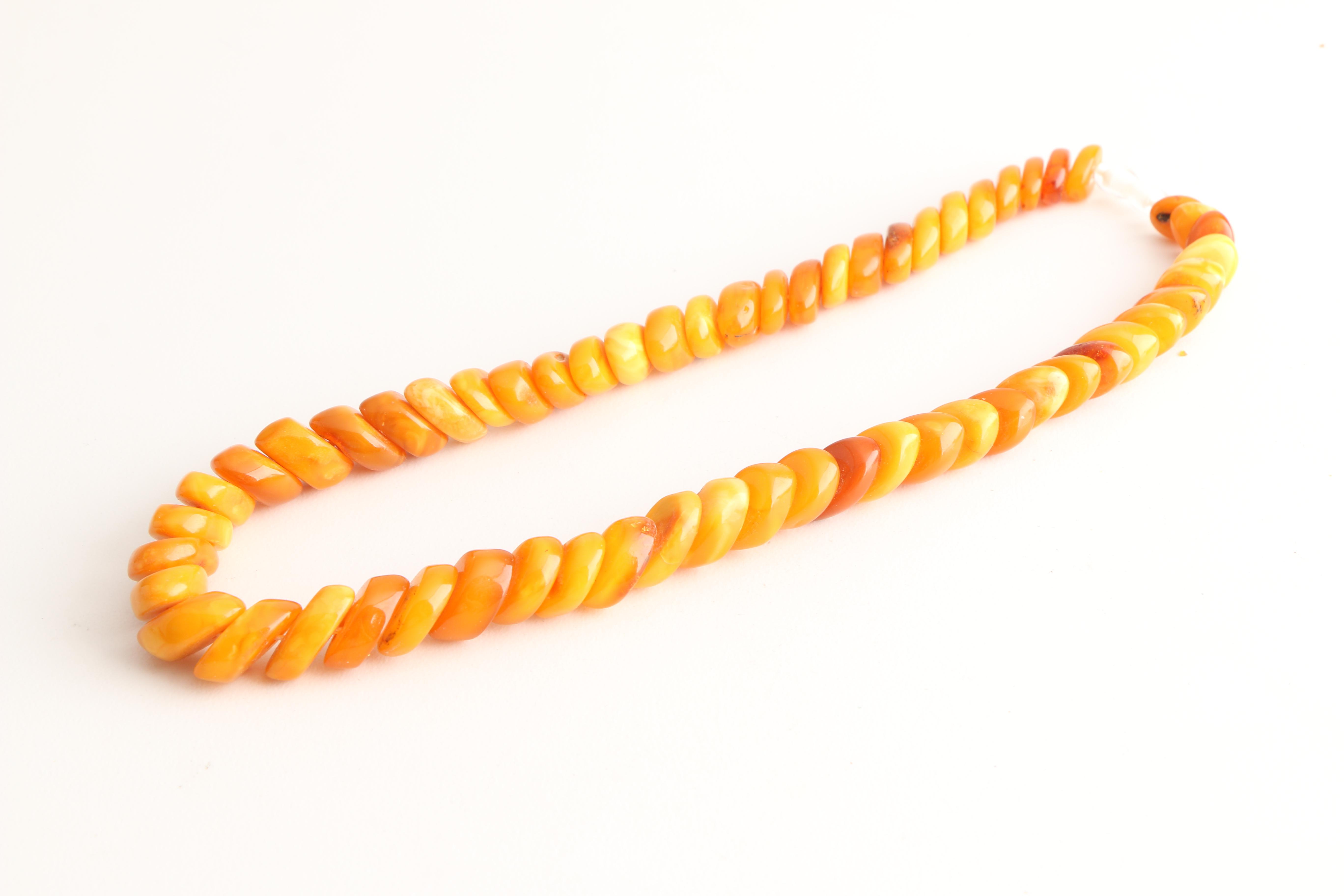 Three Amber Necklaces Including Mutton Fat Amber