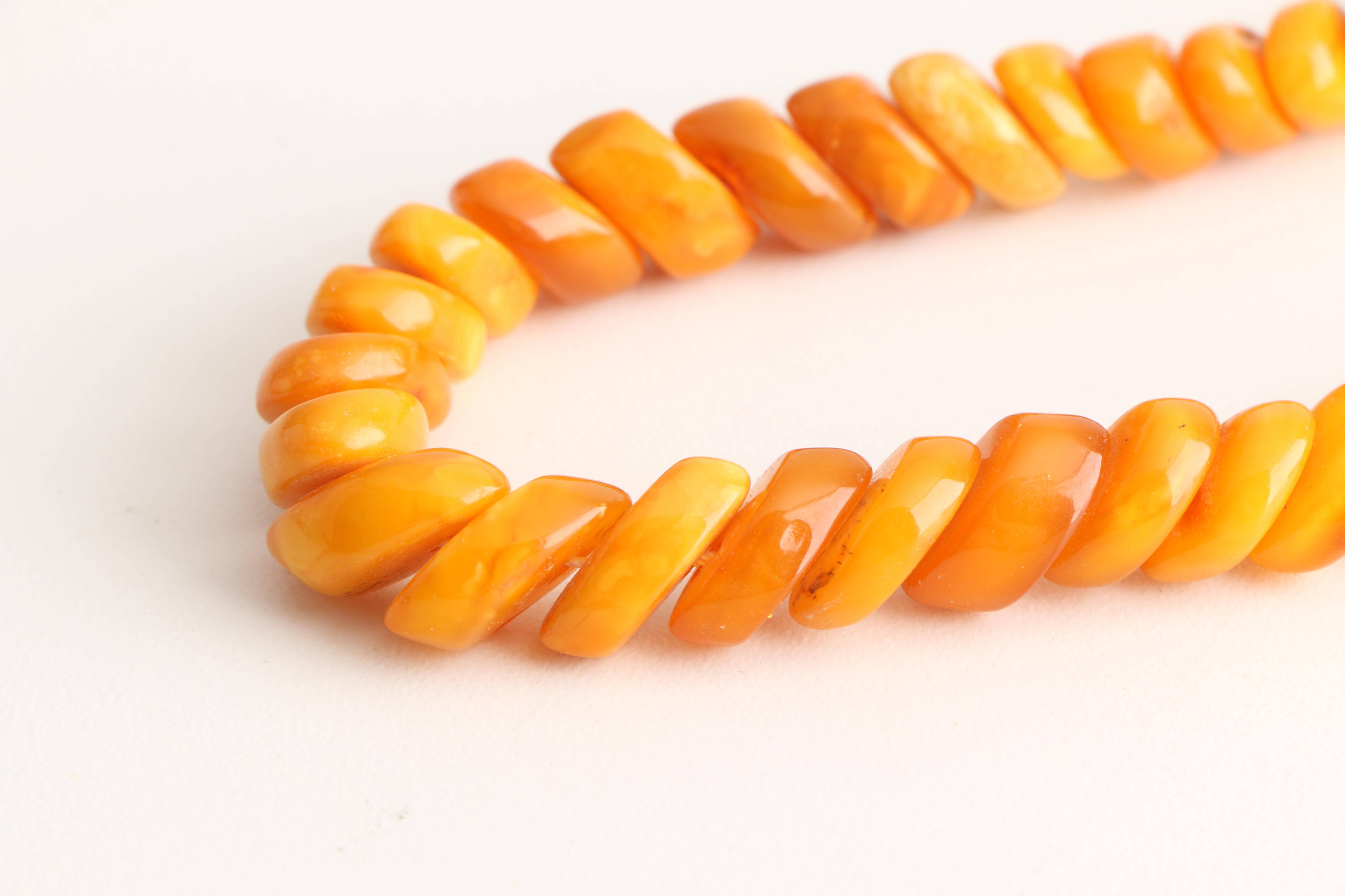 Three Amber Necklaces Including Mutton Fat Amber