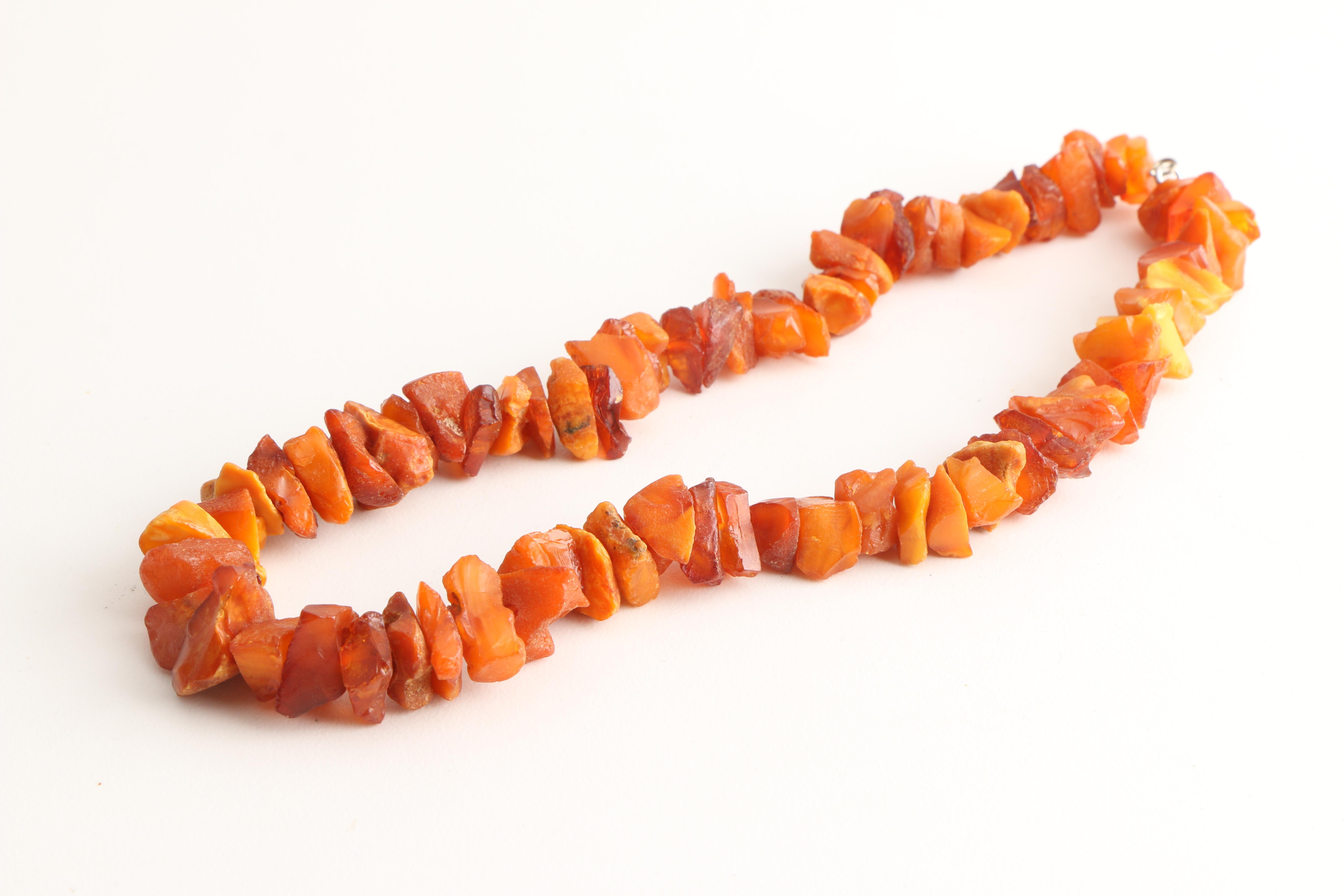 Three Amber Necklaces Including Mutton Fat Amber