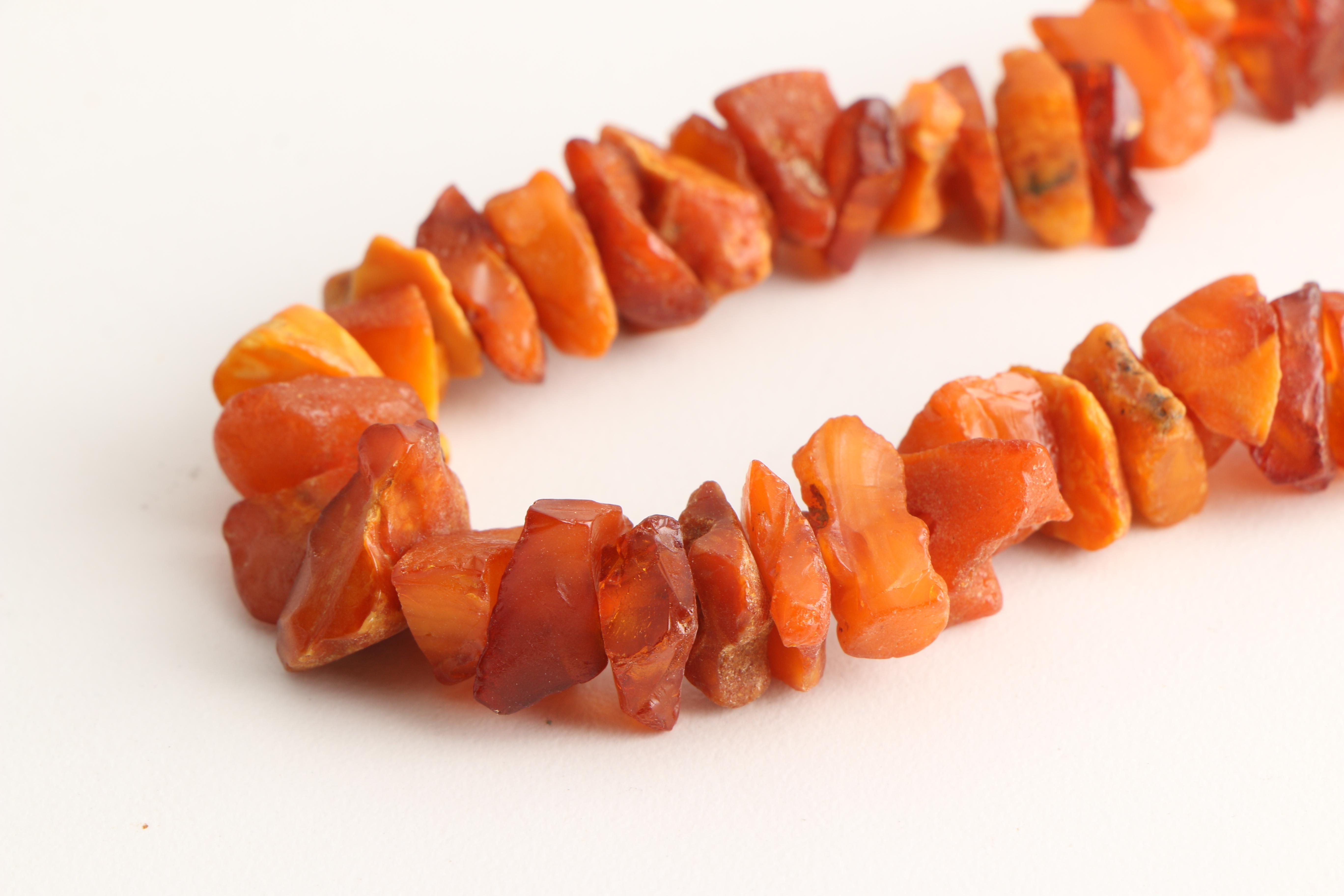 Three Amber Necklaces Including Mutton Fat Amber