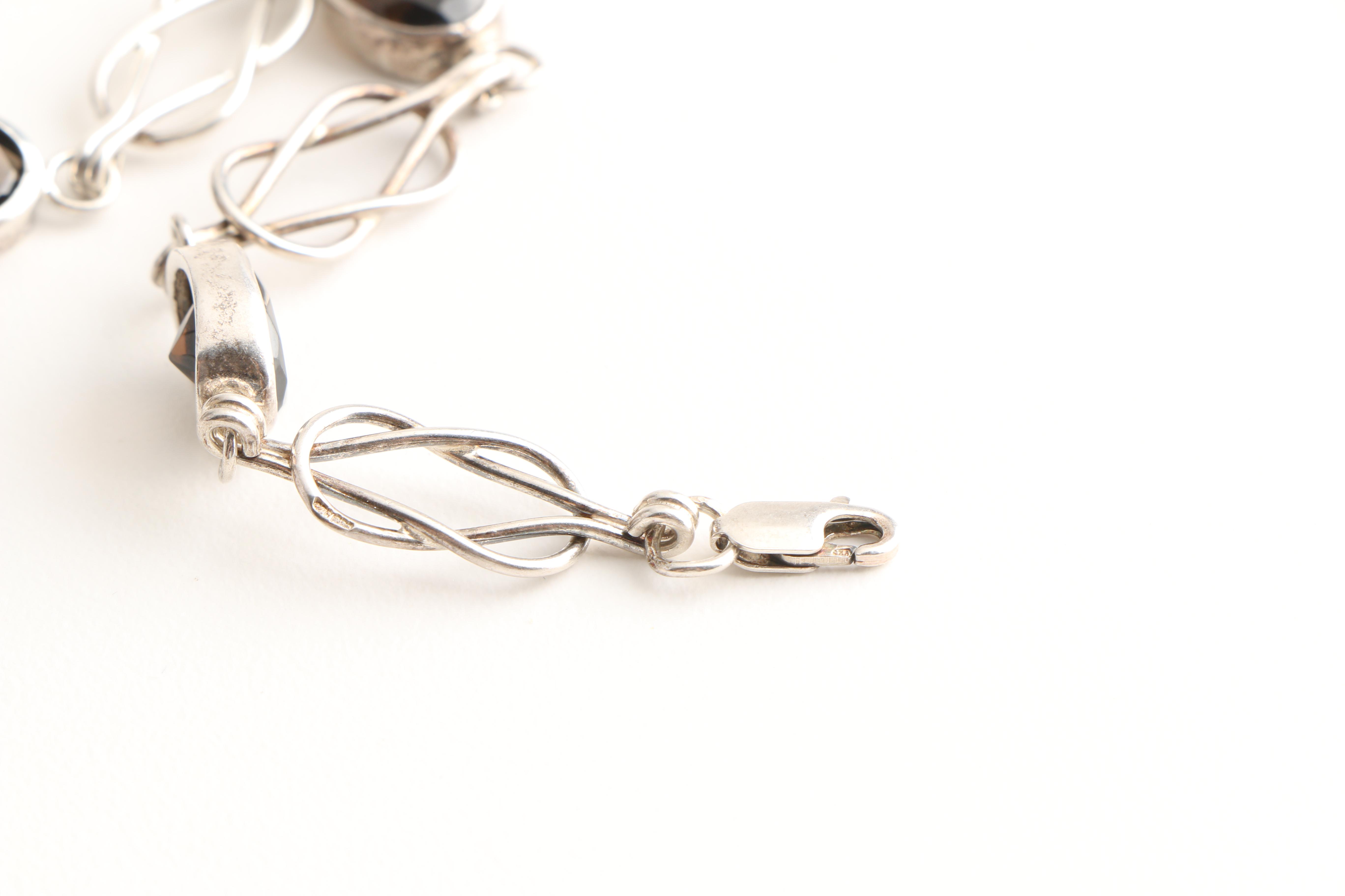 Sterling Silver Bracelet and Rings Including Gemstones