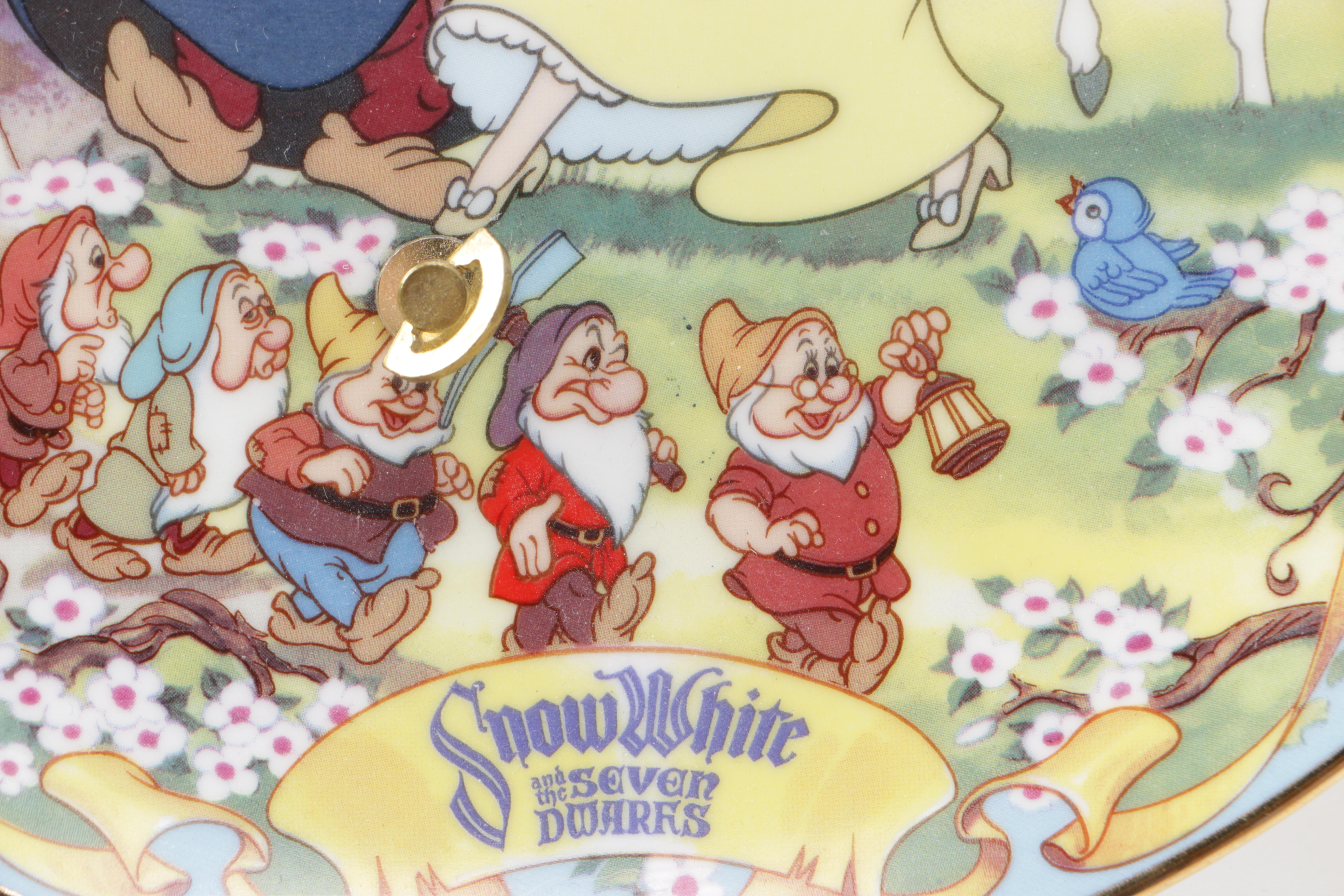 Collection of Disney Figurines and Music Boxes