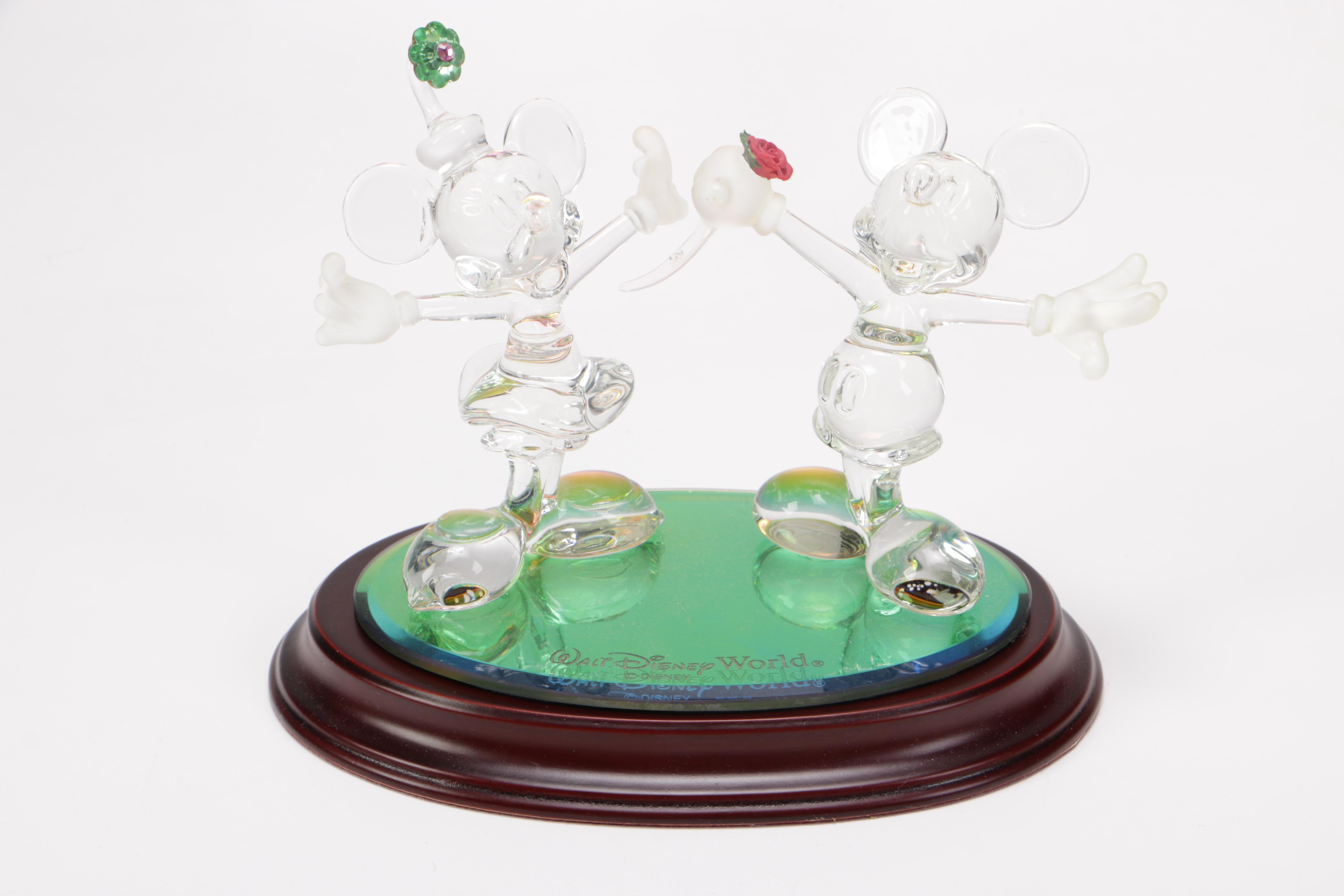 Collection of Disney Figurines and Music Boxes