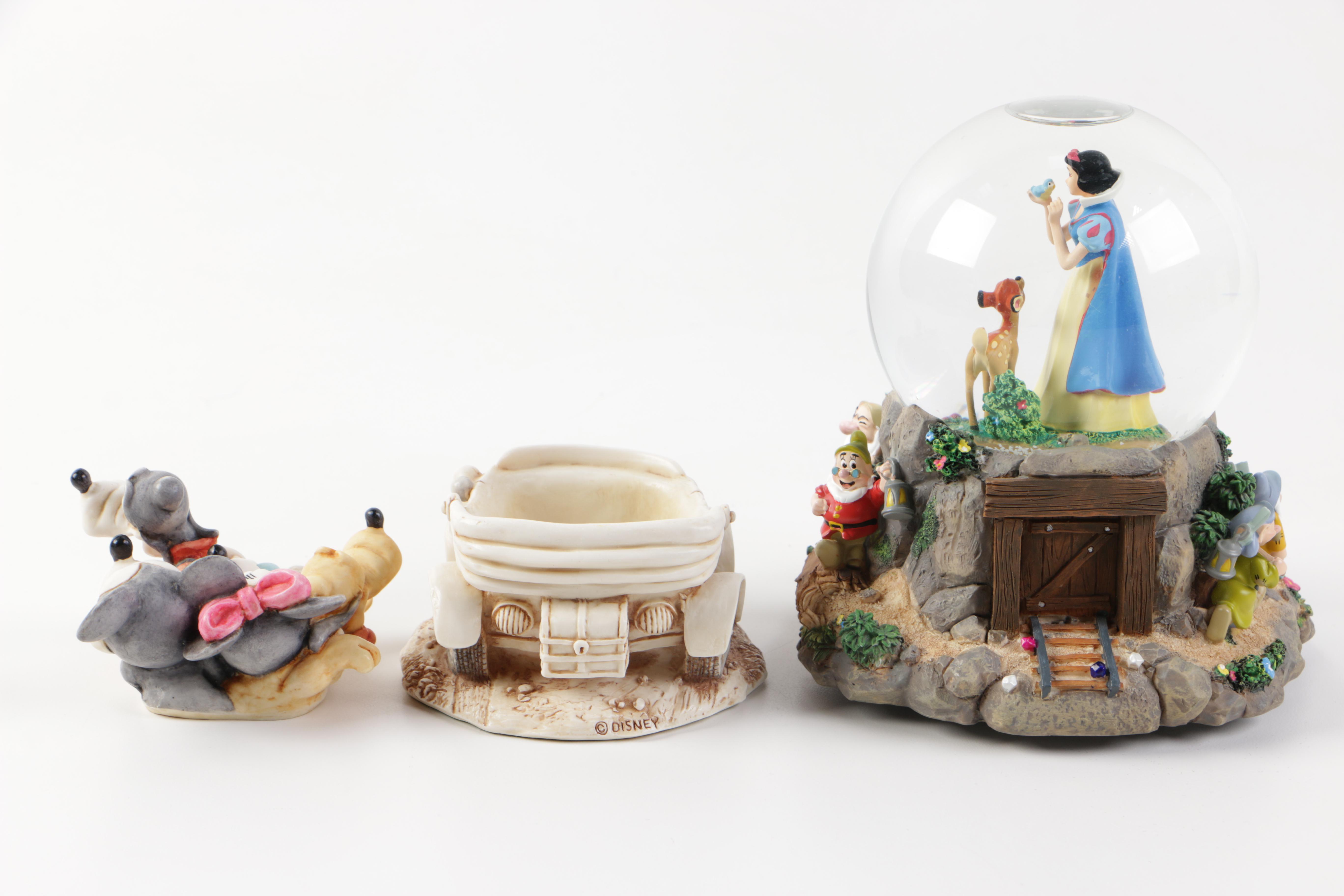 Collection of Disney Figurines and Music Boxes