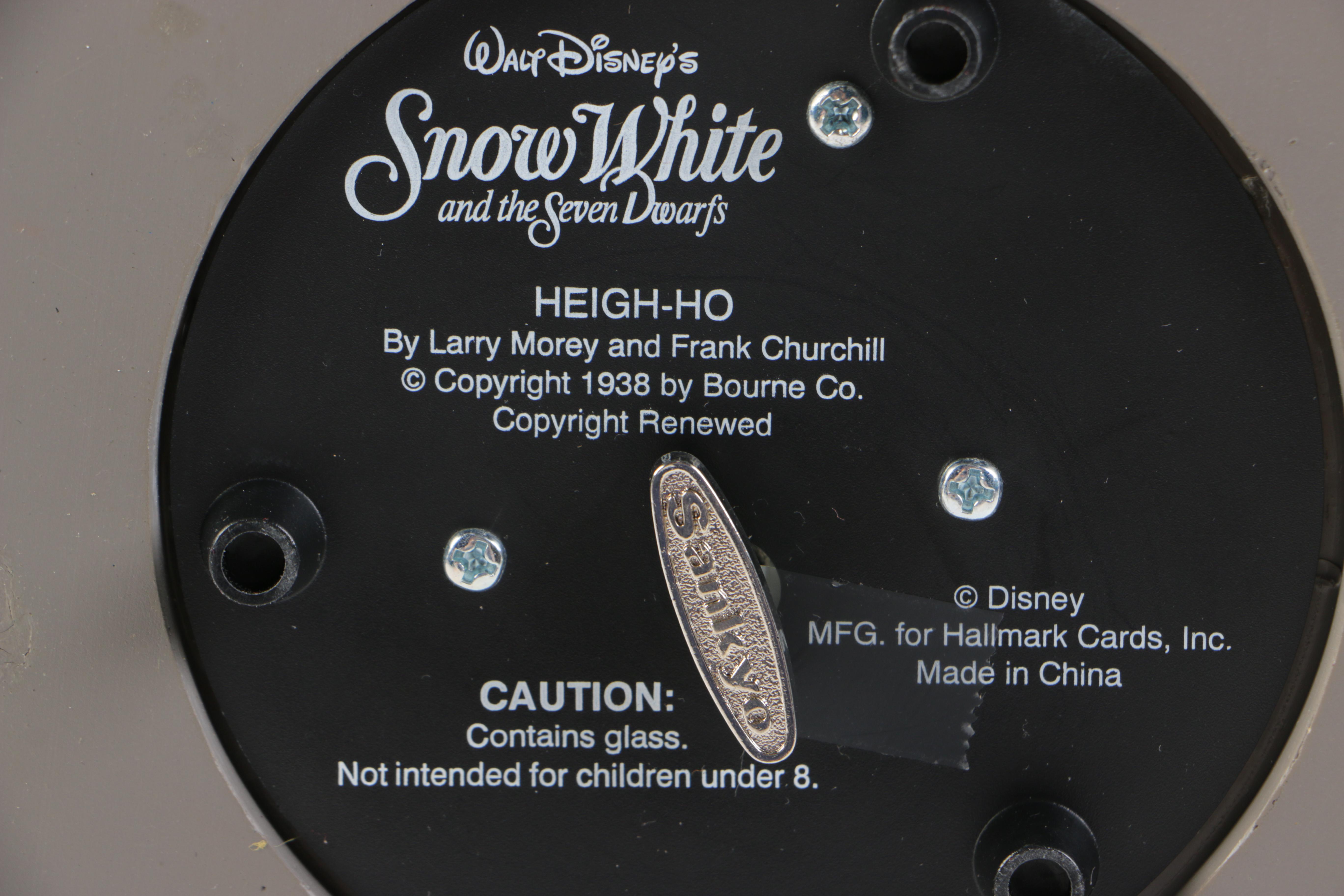 Collection of Disney Figurines and Music Boxes