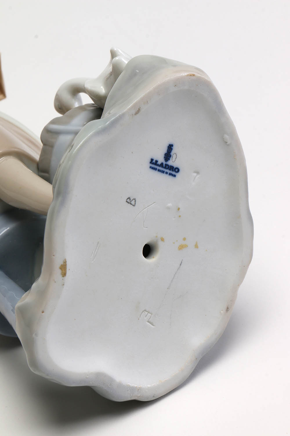 A Lladró "Girl with Milk Pail" Figurine