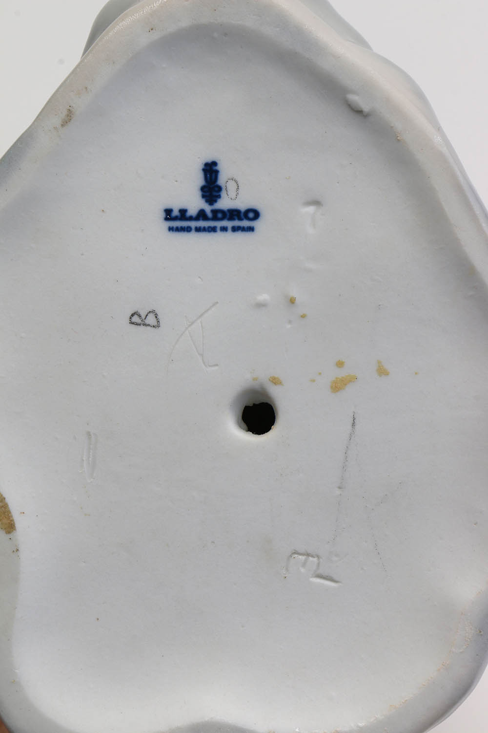 A Lladró "Girl with Milk Pail" Figurine