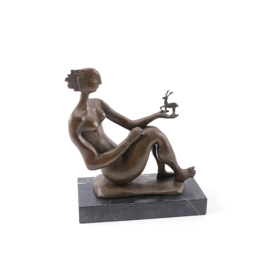 Bronze Sculpture of a Woman Holding a Deer