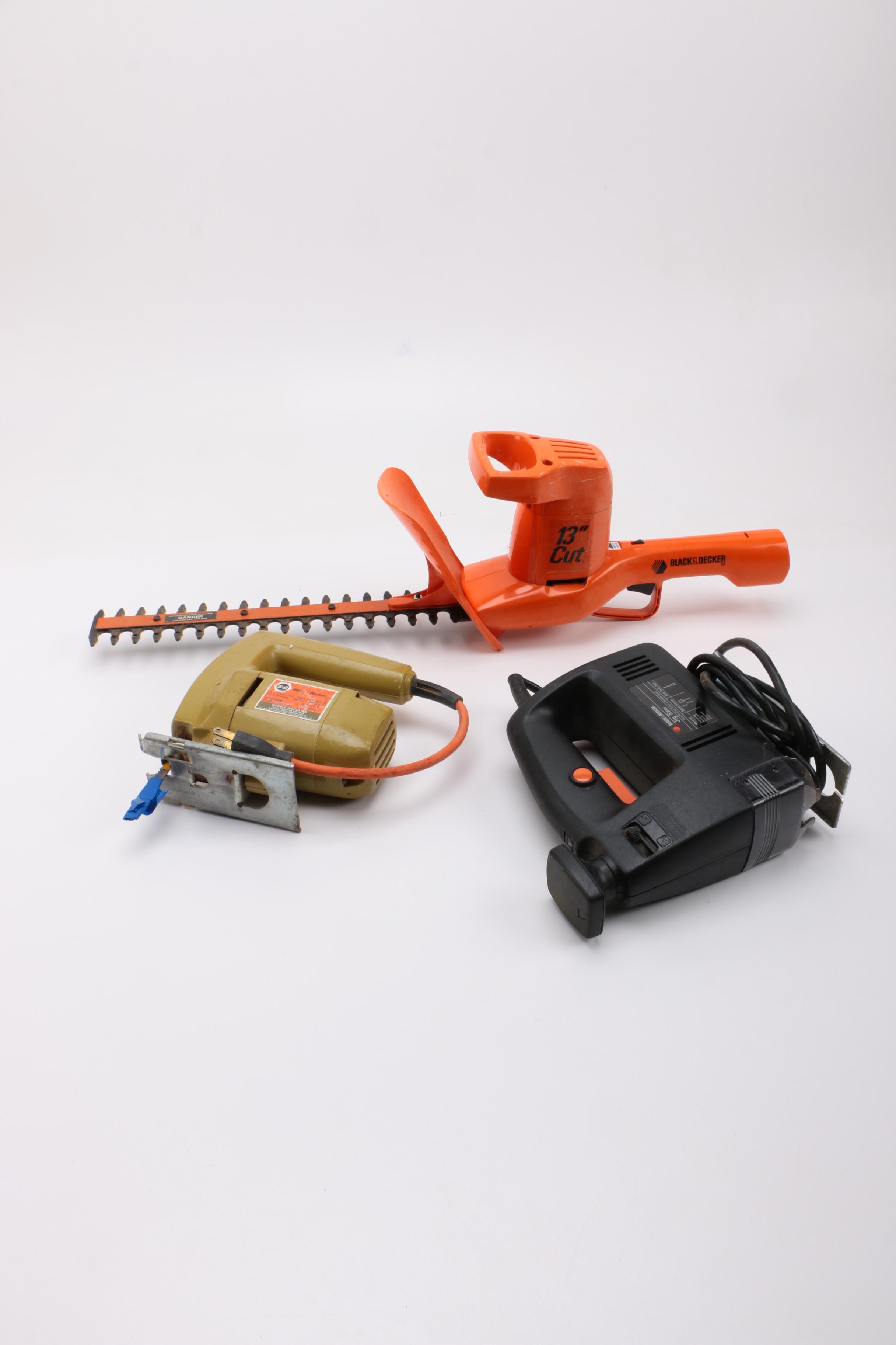 Three Black and Decker Power Tools