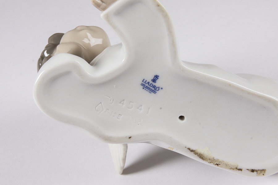 Lladró "Angel Laying Down" Figurine