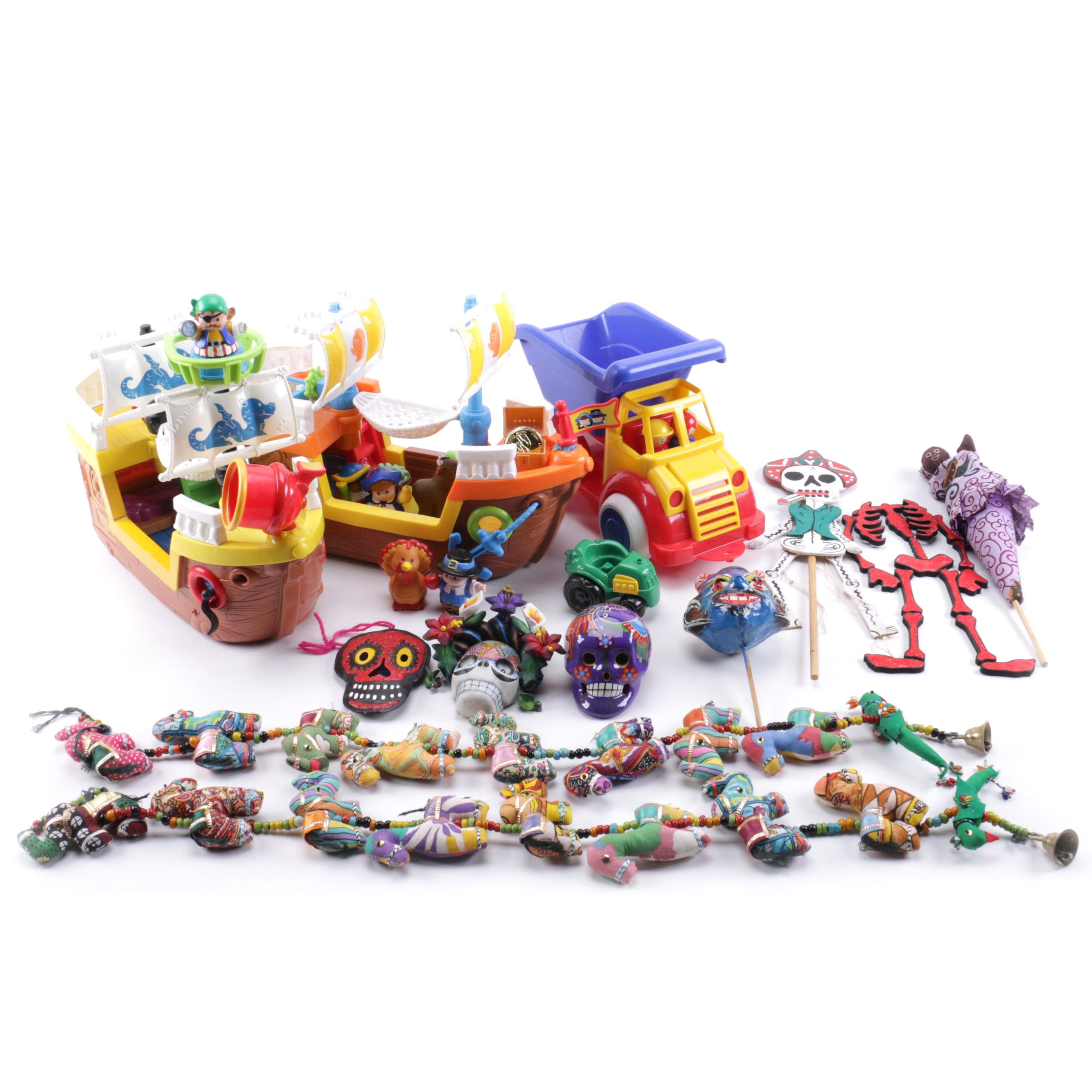 Toys and Décor Including Fisher-Price and Day of the Dead