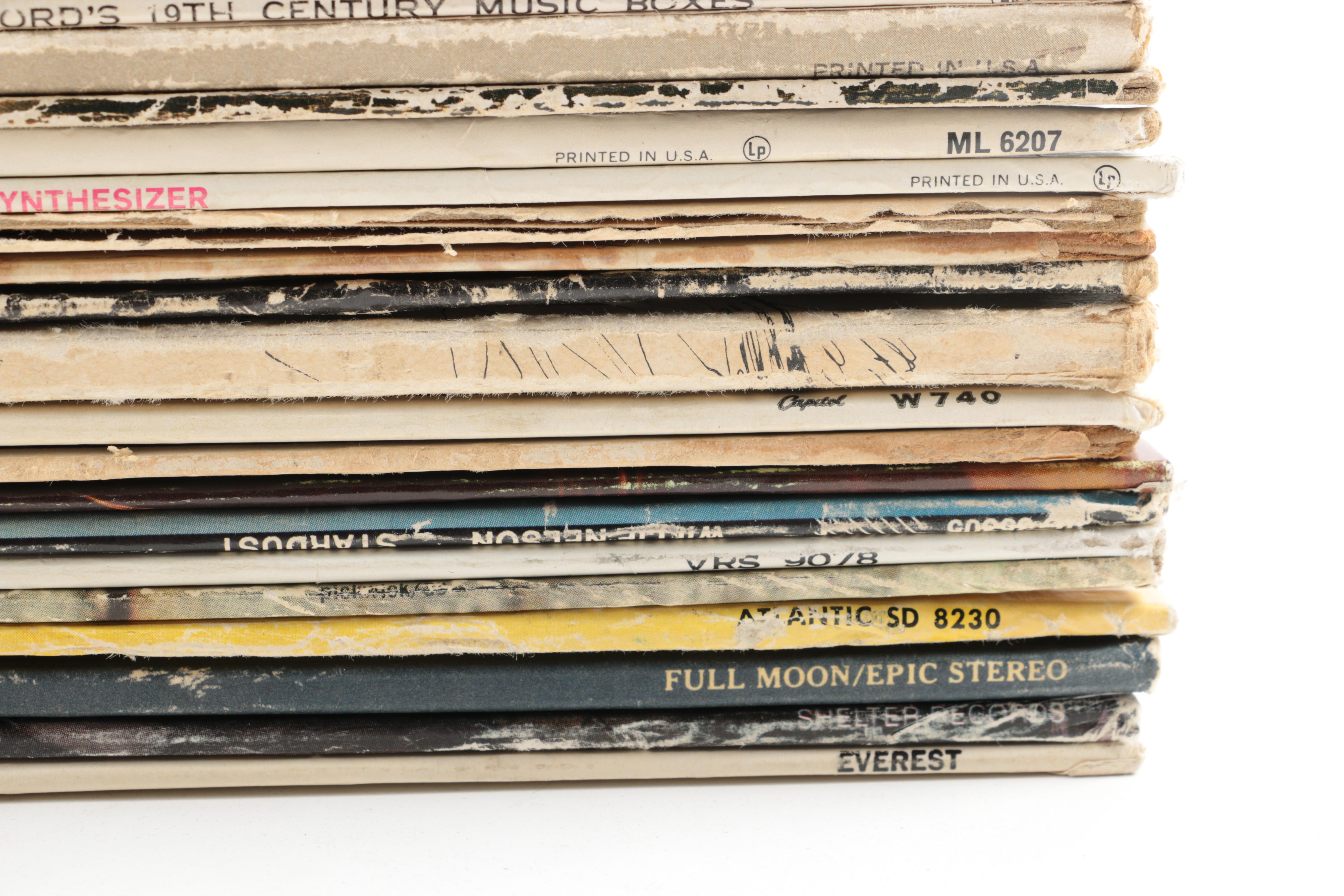 Crosley Record Player and Vintage Folk, Pop, and Soundtrack LPs