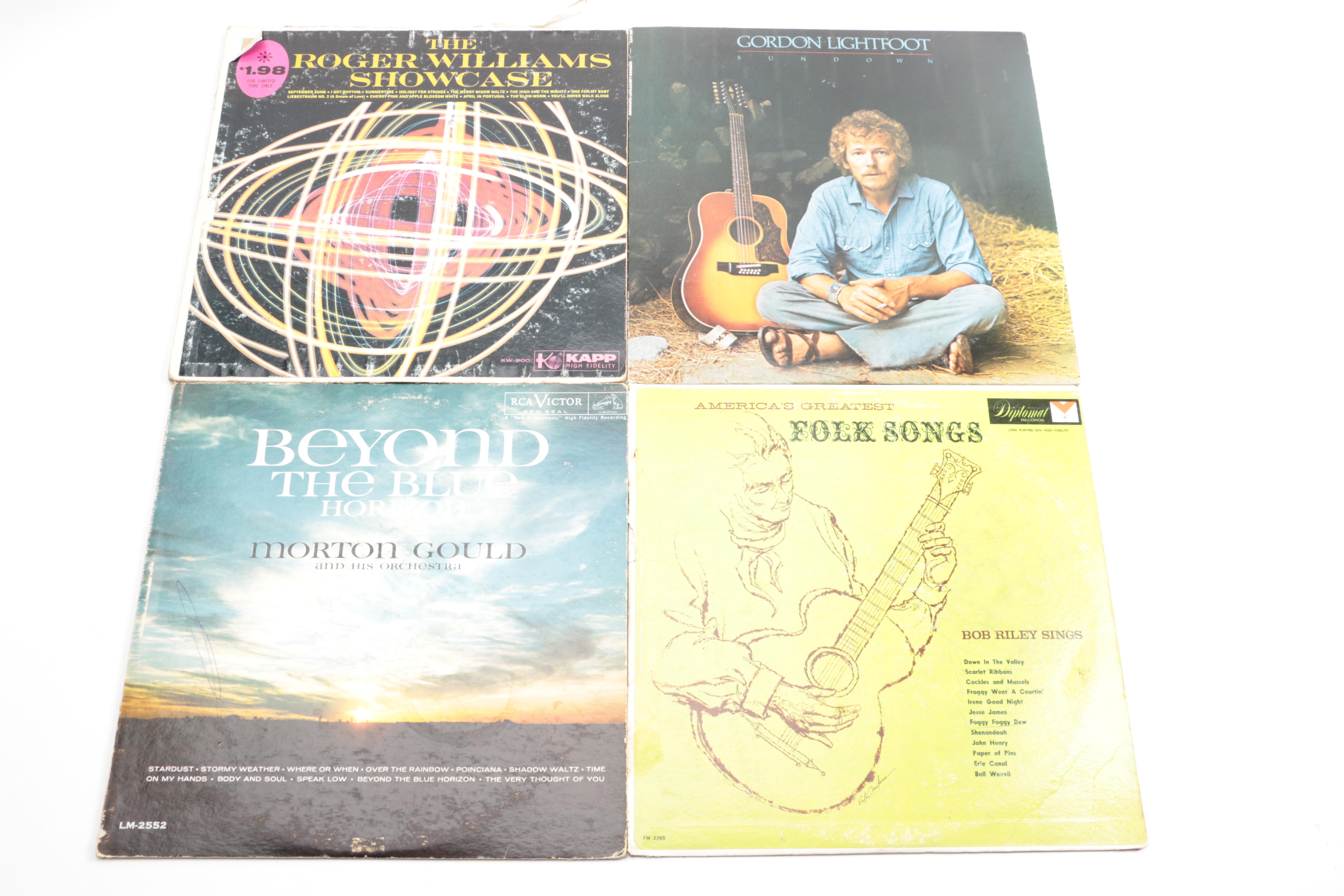 Crosley Record Player and Vintage Folk, Pop, and Soundtrack LPs