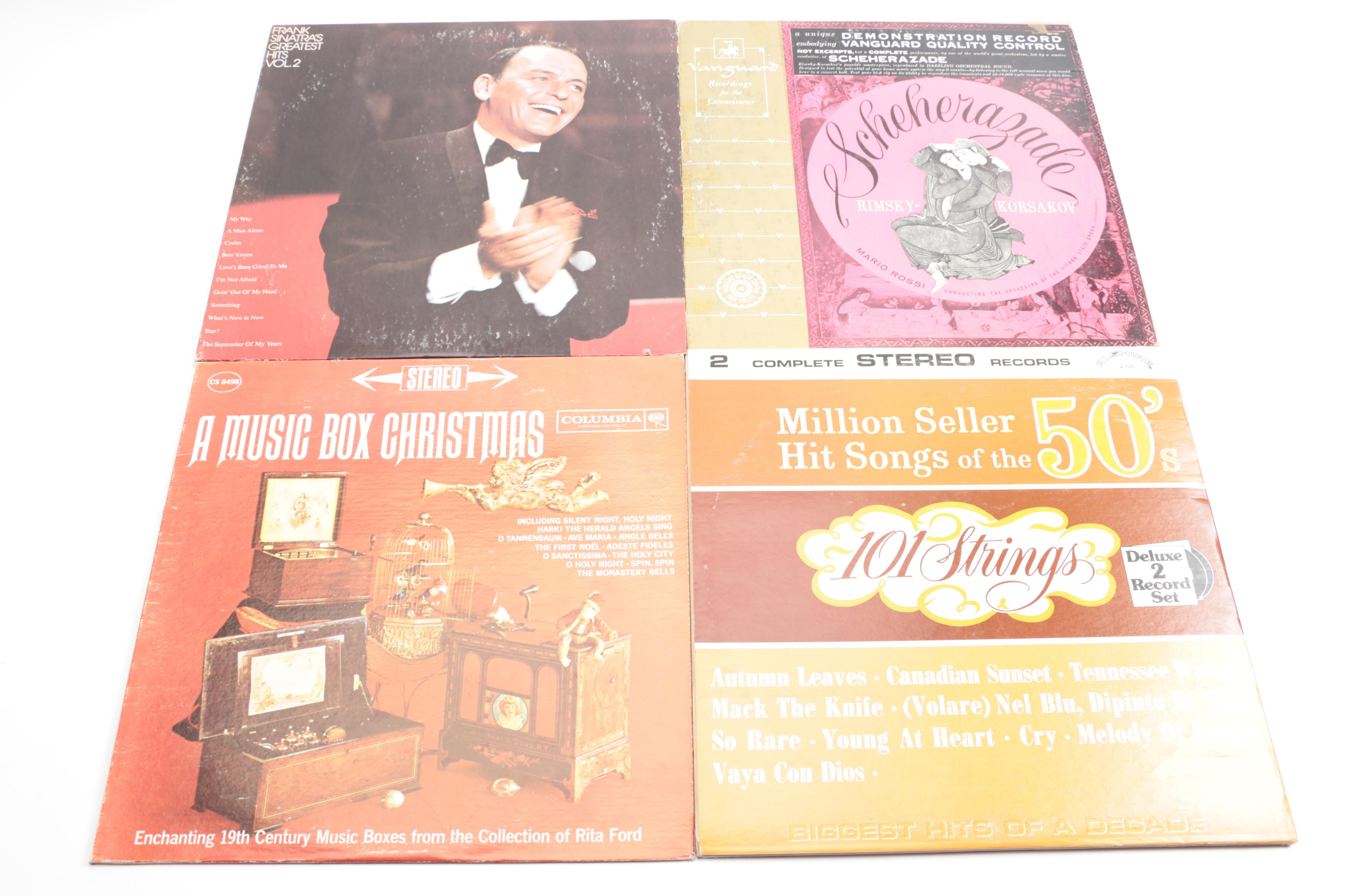 Crosley Record Player and Vintage Folk, Pop, and Soundtrack LPs