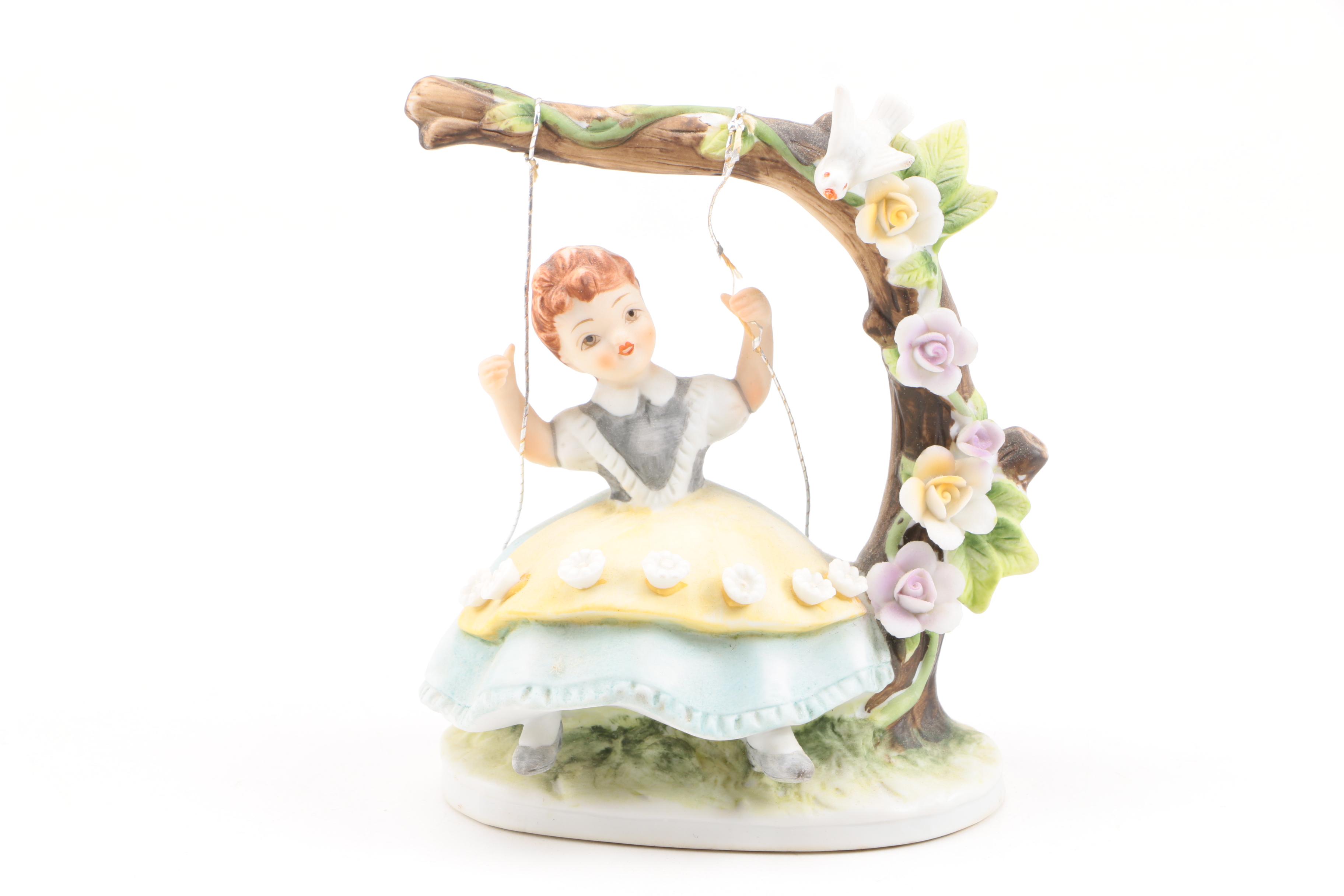 Porcelain Children Figurines Featuring Lefton