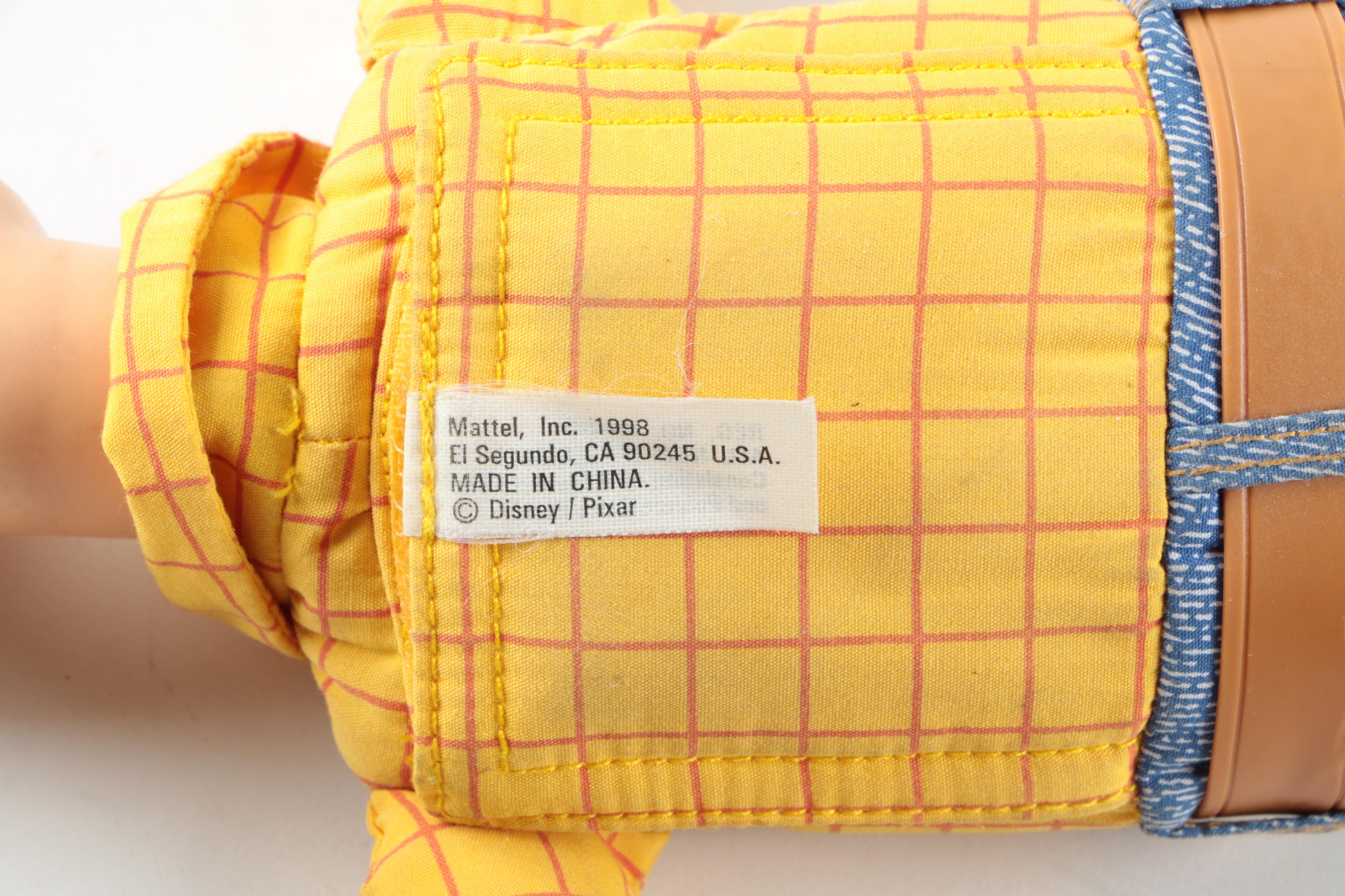 Collection of Sheriff Woody, Pee Wee Herman, and Ernest P. Worrell Dolls