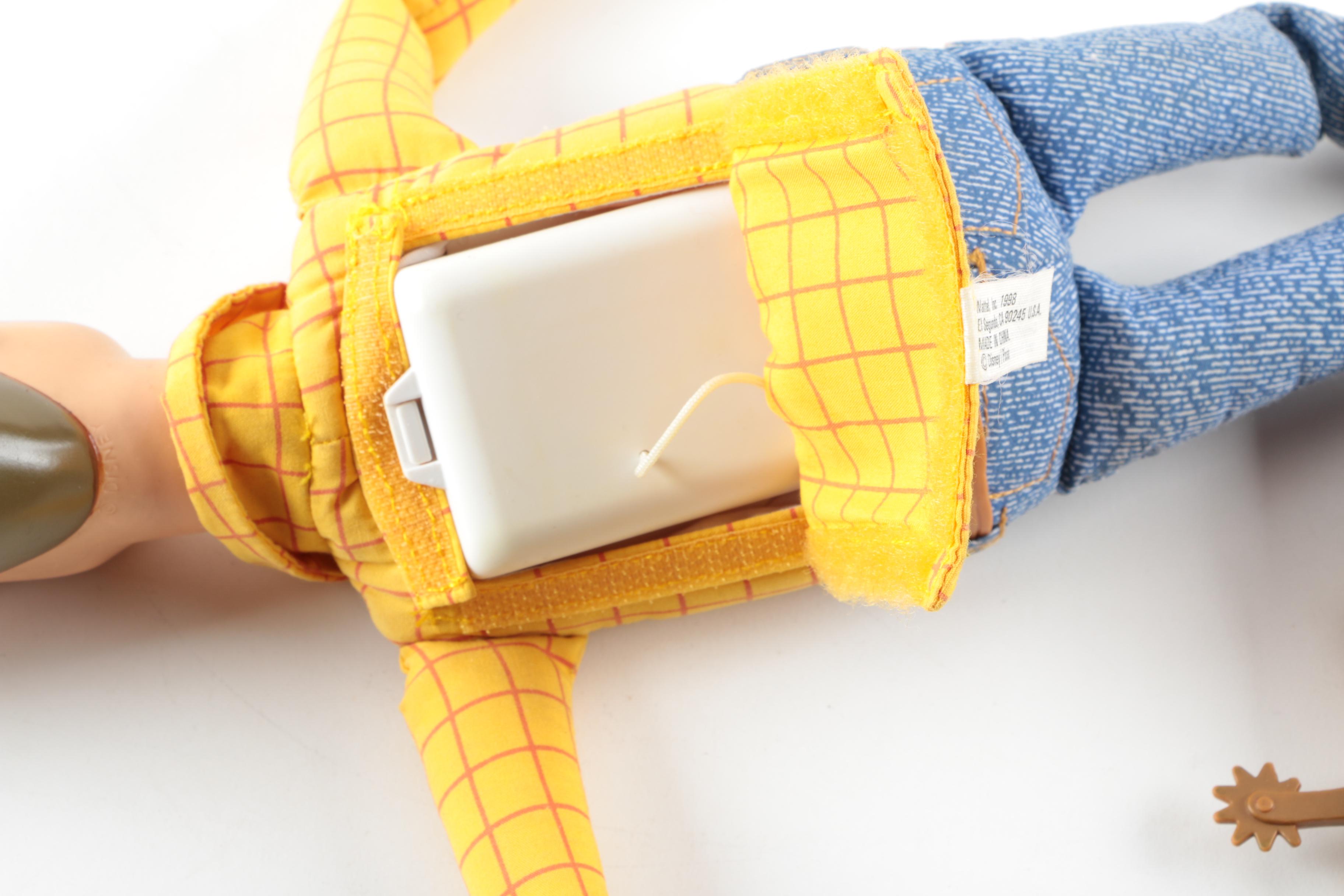 Collection of Sheriff Woody, Pee Wee Herman, and Ernest P. Worrell Dolls