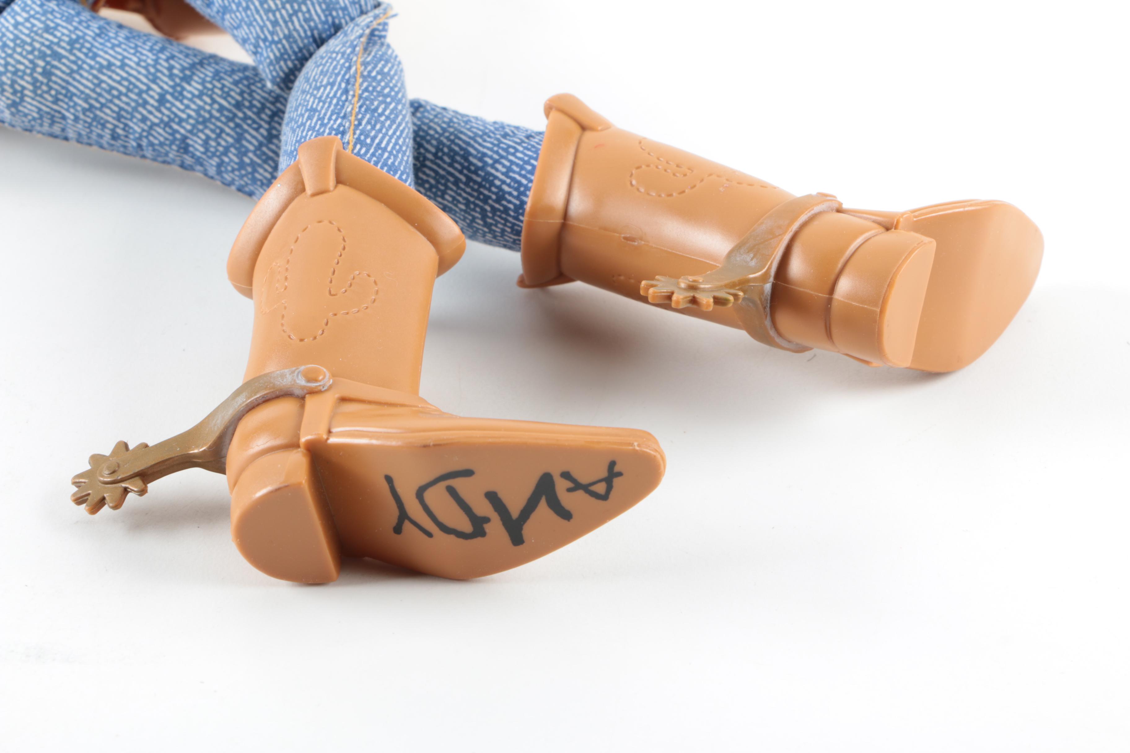 Collection of Sheriff Woody, Pee Wee Herman, and Ernest P. Worrell Dolls