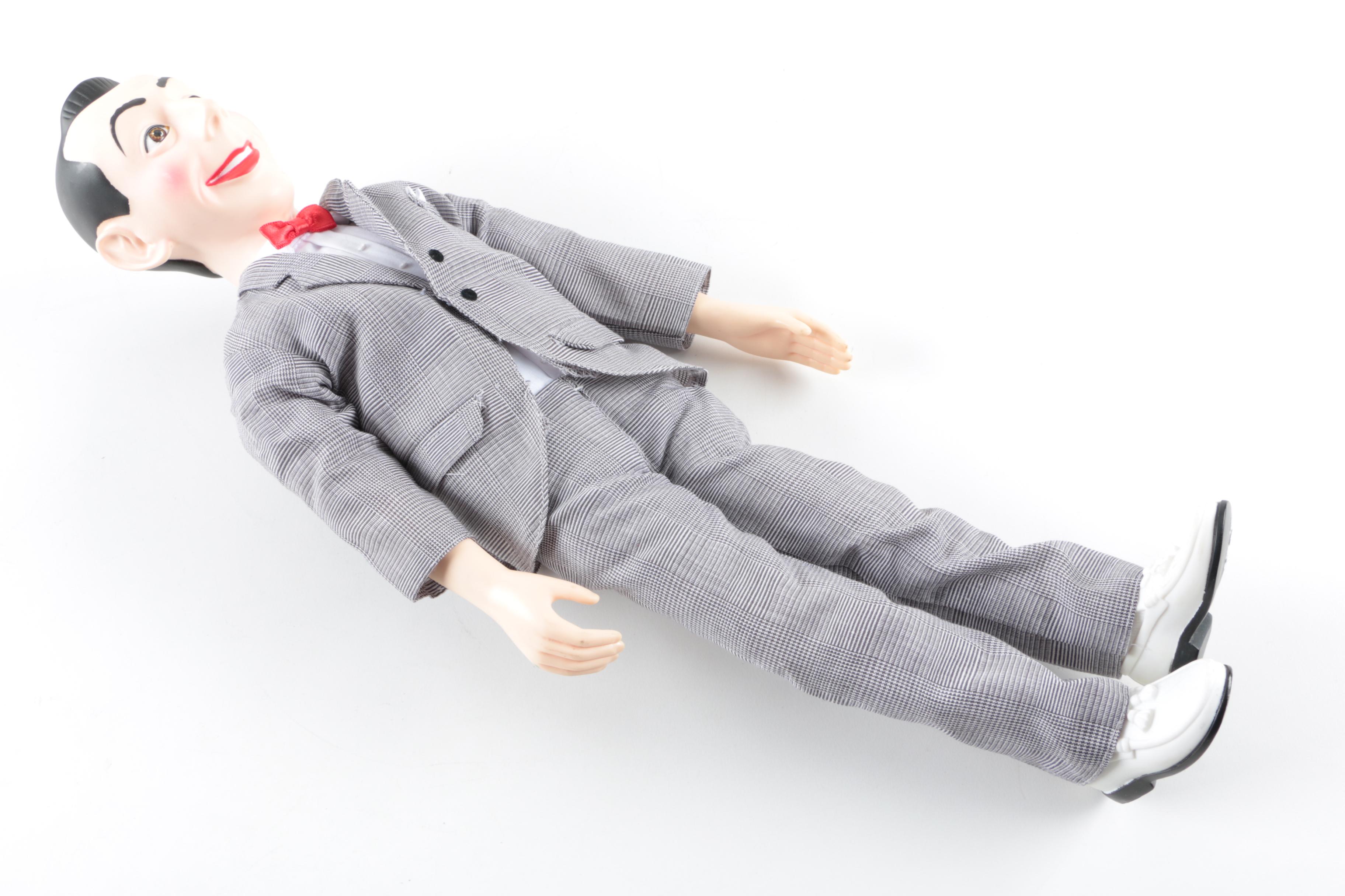 Collection of Sheriff Woody, Pee Wee Herman, and Ernest P. Worrell Dolls