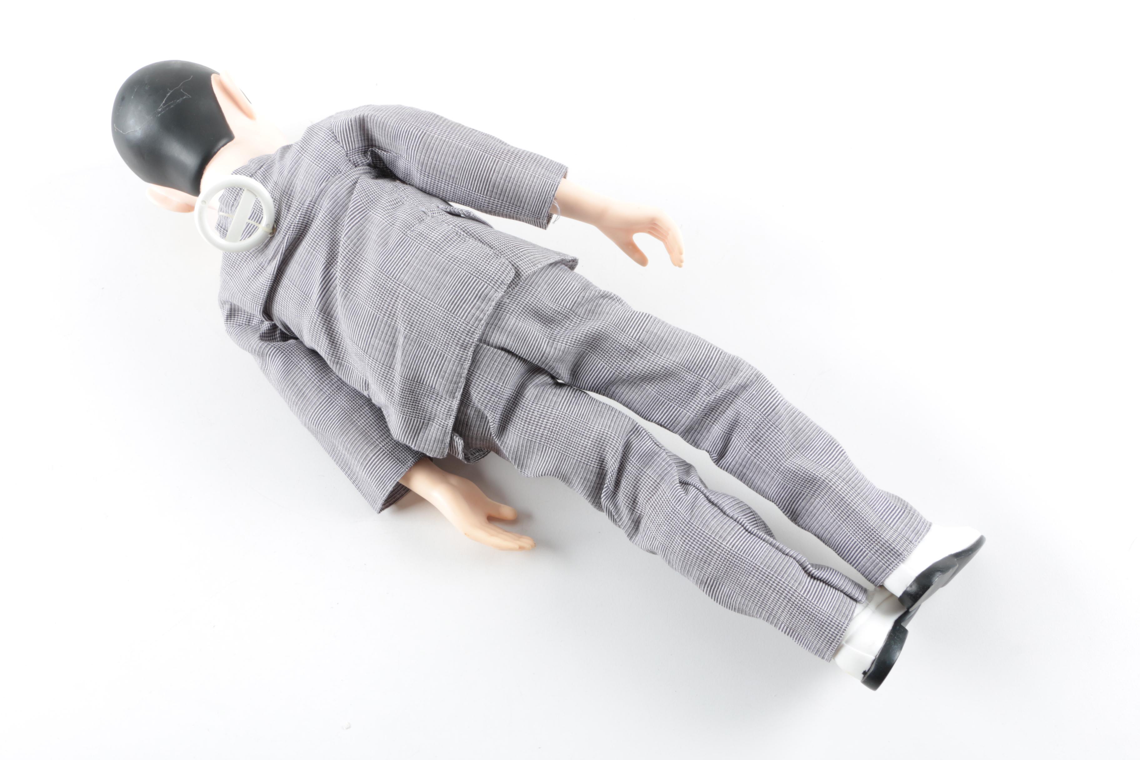 Collection of Sheriff Woody, Pee Wee Herman, and Ernest P. Worrell Dolls