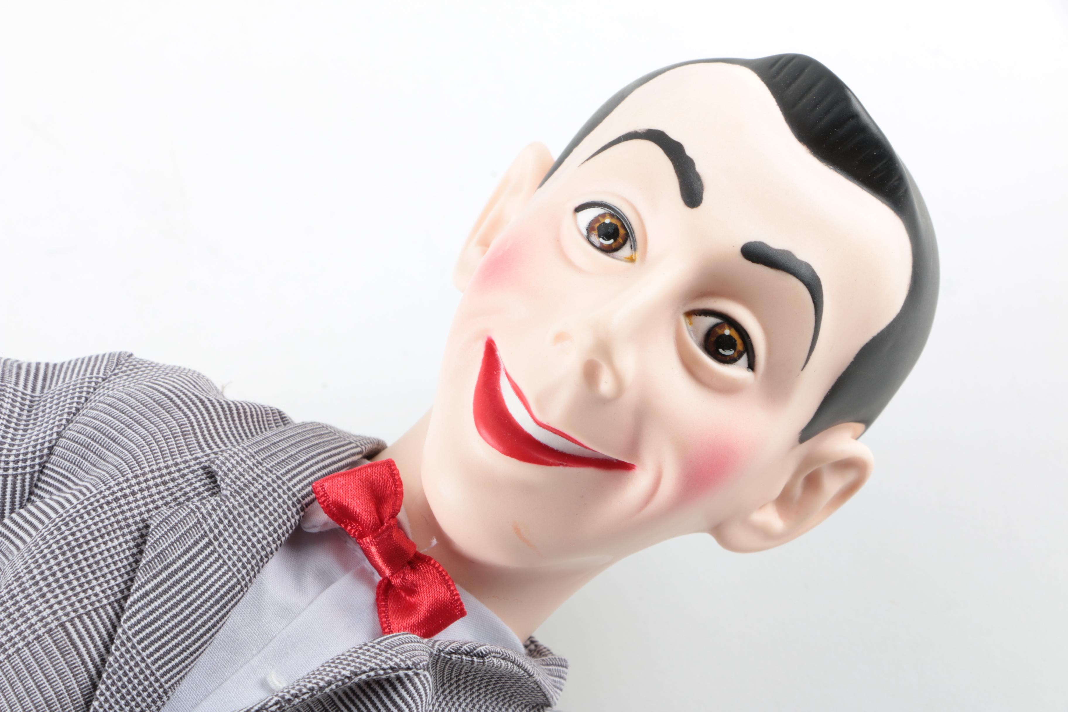 Collection of Sheriff Woody, Pee Wee Herman, and Ernest P. Worrell Dolls