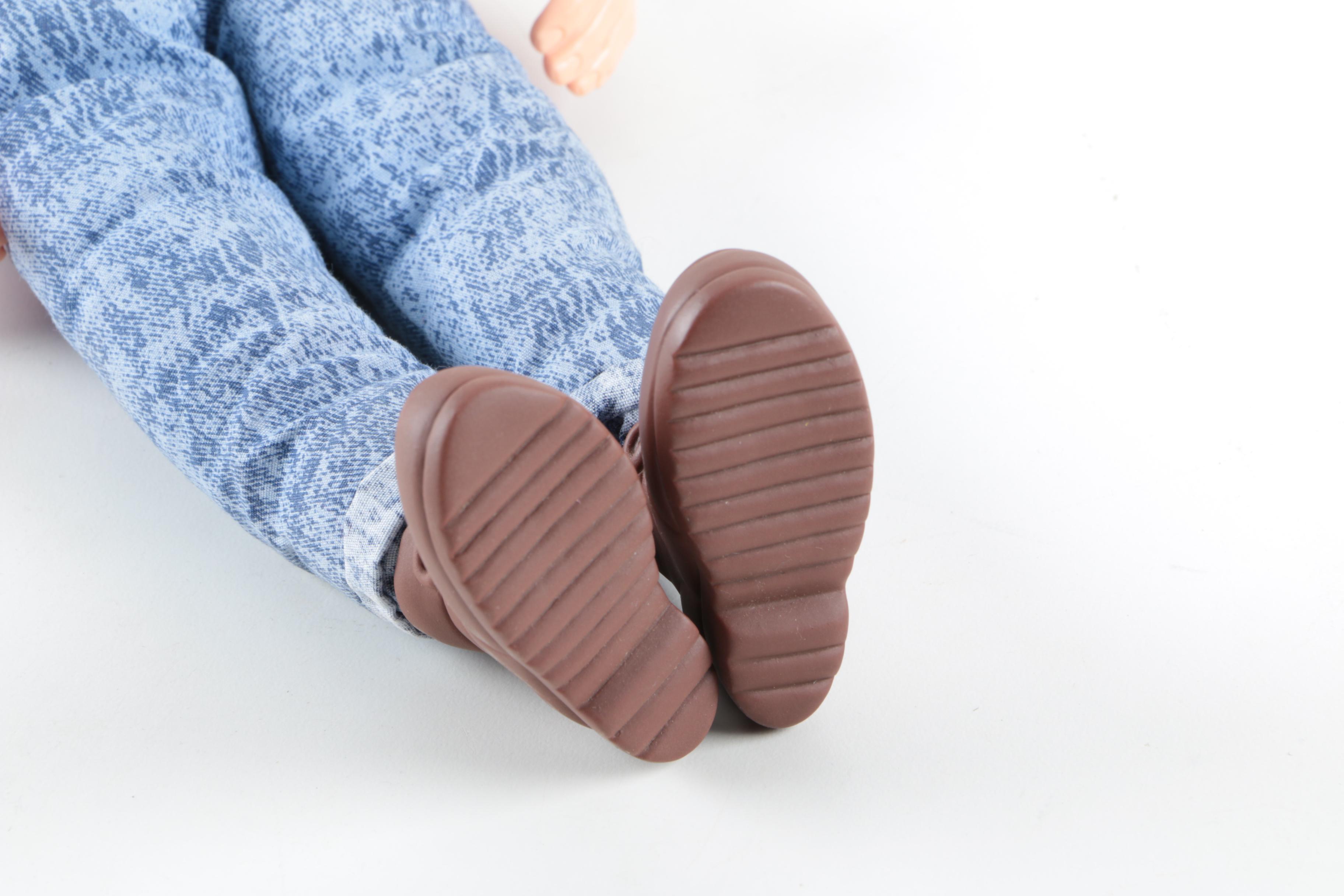 Collection of Sheriff Woody, Pee Wee Herman, and Ernest P. Worrell Dolls