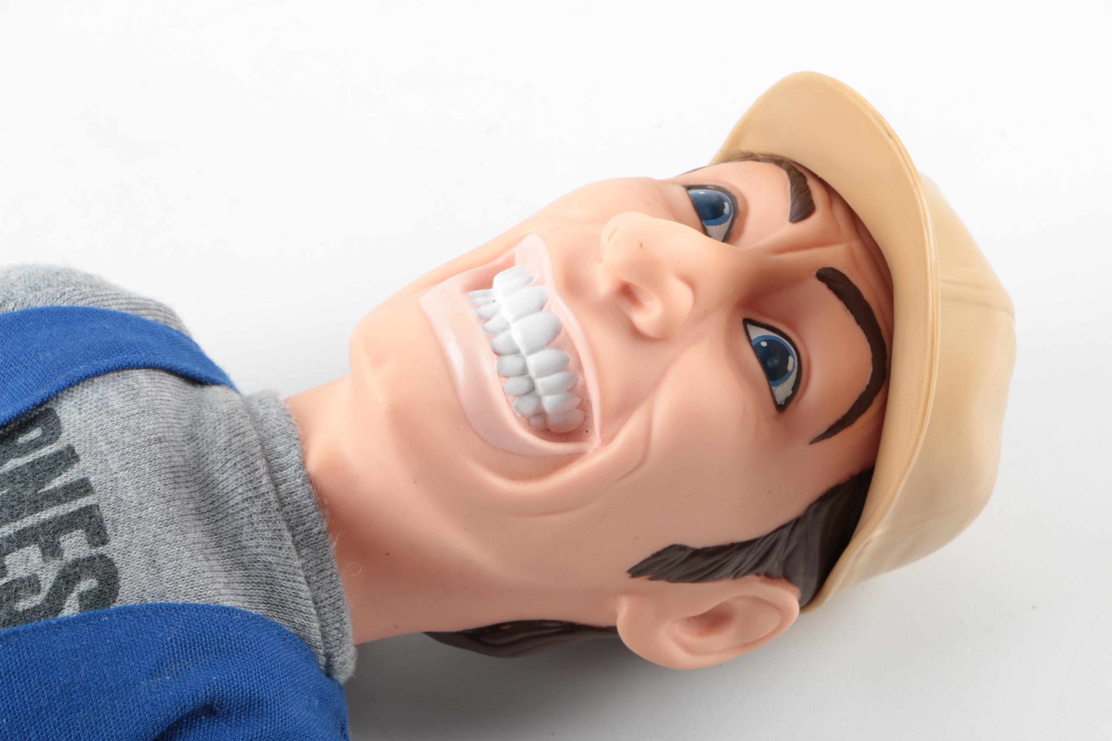 Collection of Sheriff Woody, Pee Wee Herman, and Ernest P. Worrell Dolls