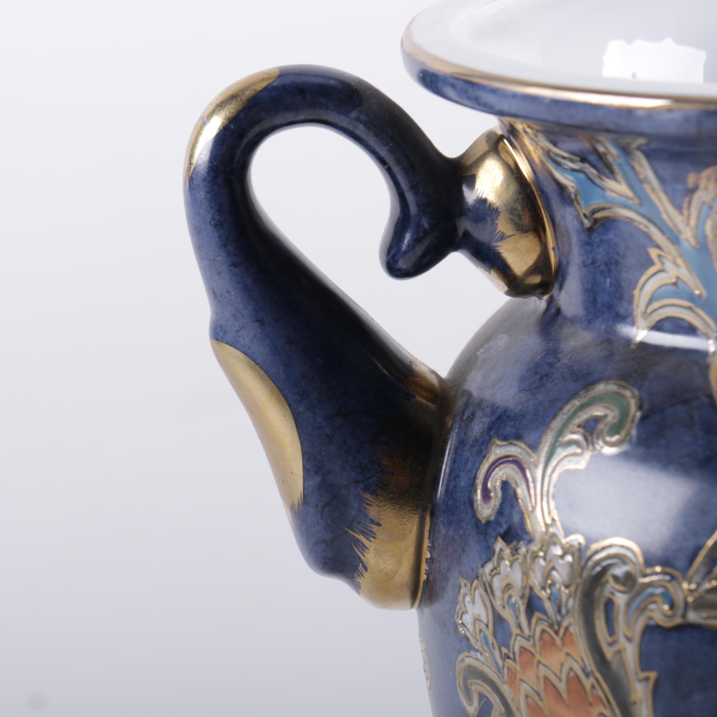 Grouping of Handpainted Ceramic Vessels