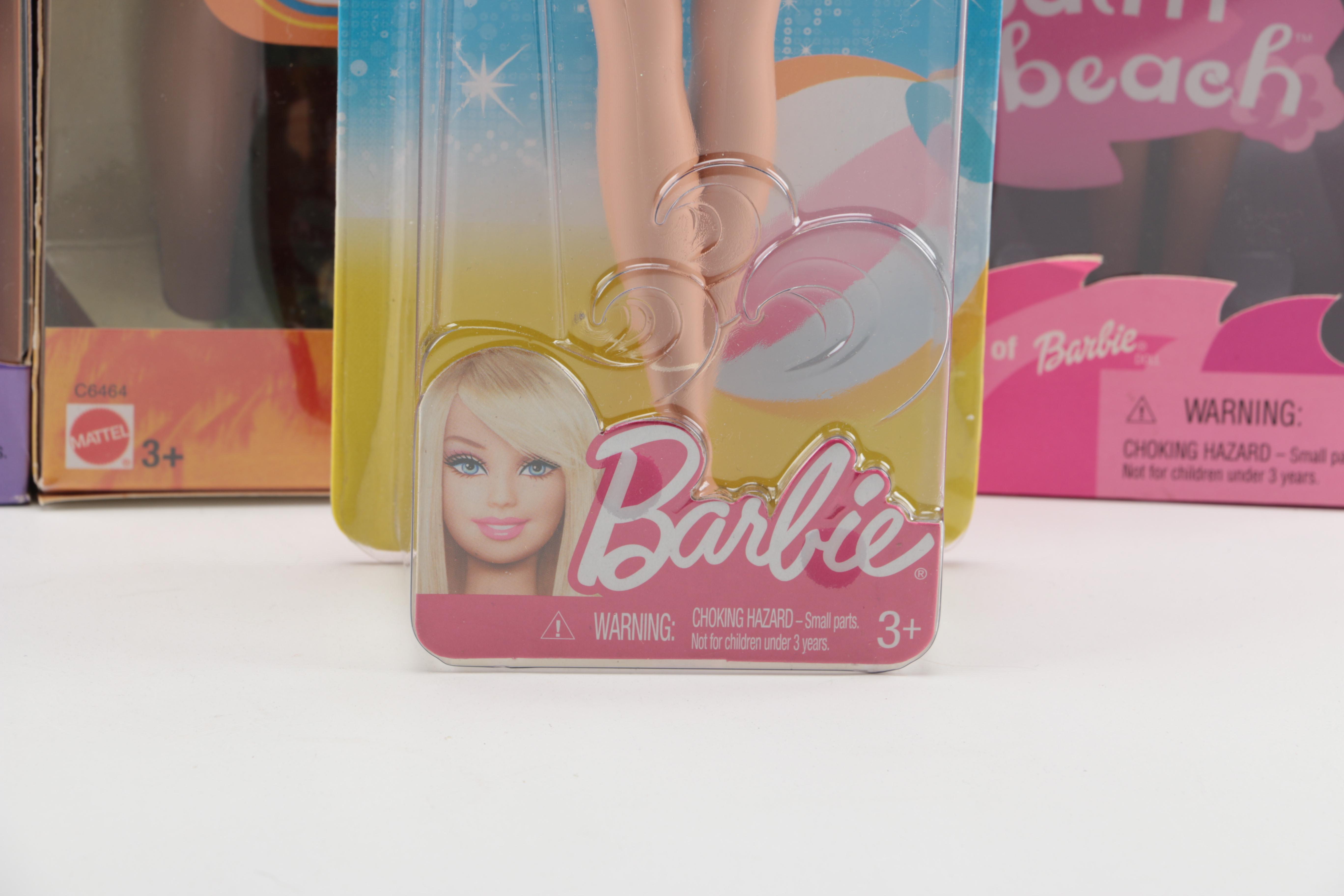 Collection of Boxed Barbie Dolls